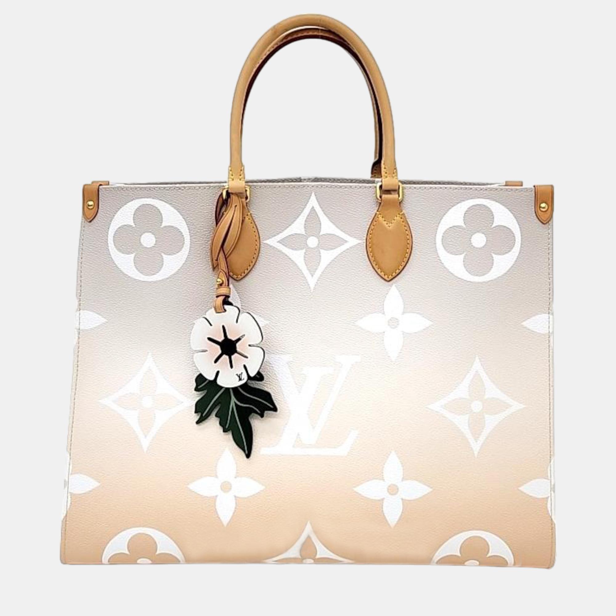 Louis vuitton light peach monogram giant canvas  on the go by the pool tote bag