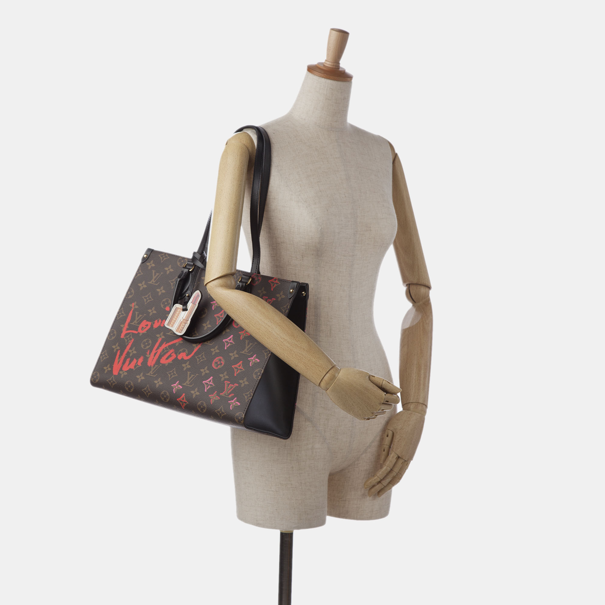 Louis Vuitton Limited Edition Monogram Fall In Love OntheGo Tote MM, Brown
Louis Vuitton Limited Edition Monogram Fall In Love OntheGo Tote MM, Brown