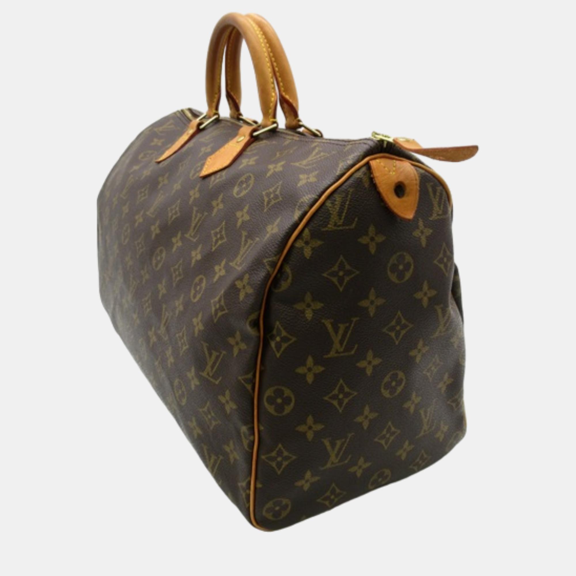 Louis Vuitton Brown Canvas Monogram Speedy 35 Bag
Louis Vuitton Brown Canvas Monogram Speedy 35 Bag