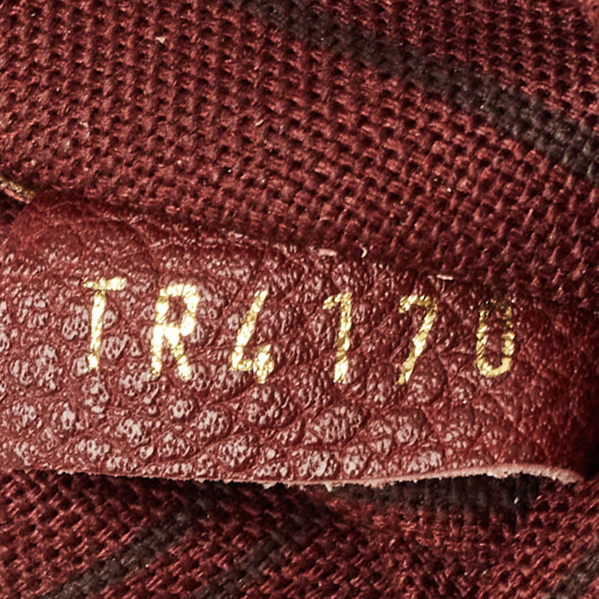 Louis Vuitton Flamme Monogram Empreinte Leather Petillante Clutch