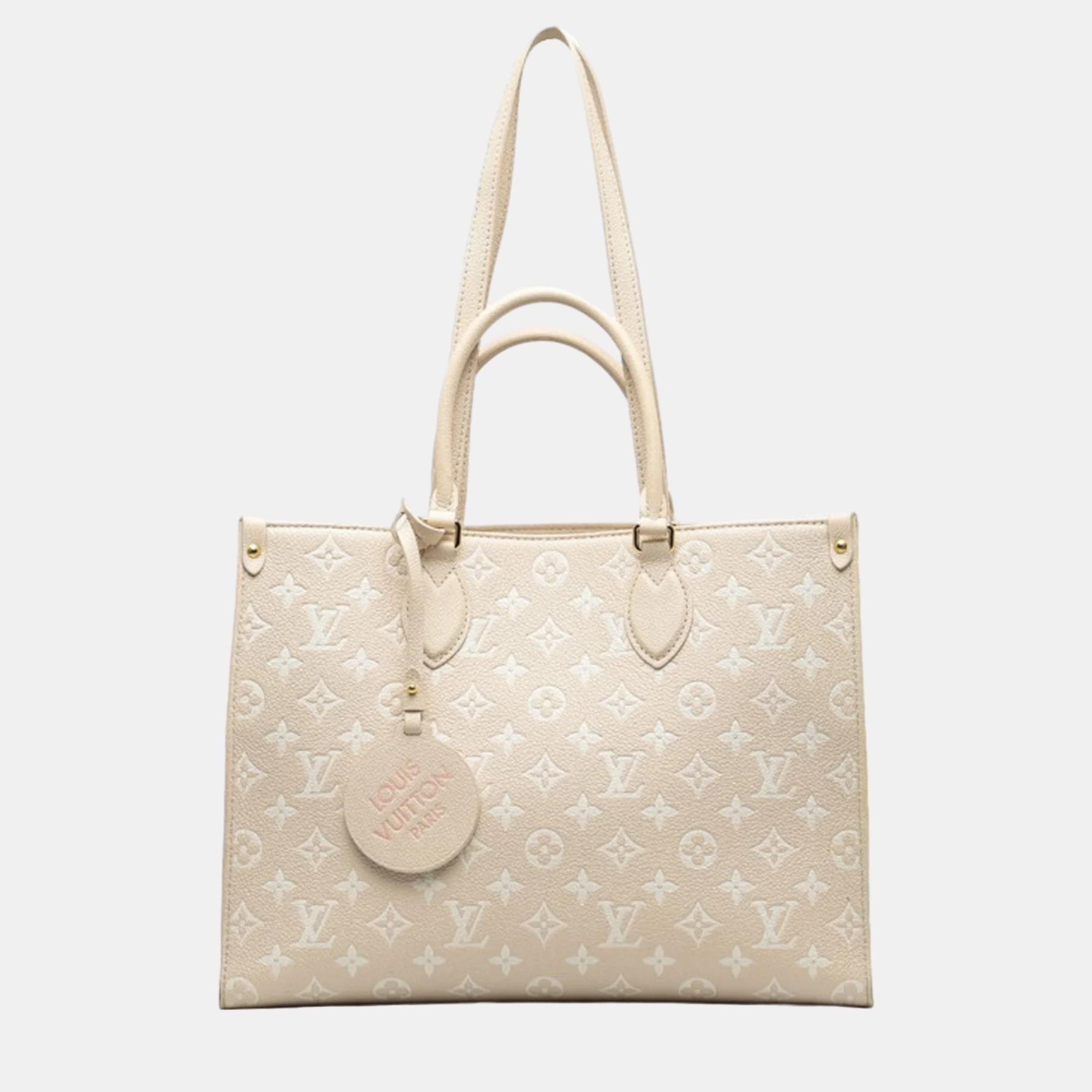 Louis vuitton rose beige yellow monogram empreinte leather spring in the city onthego mm tote bag