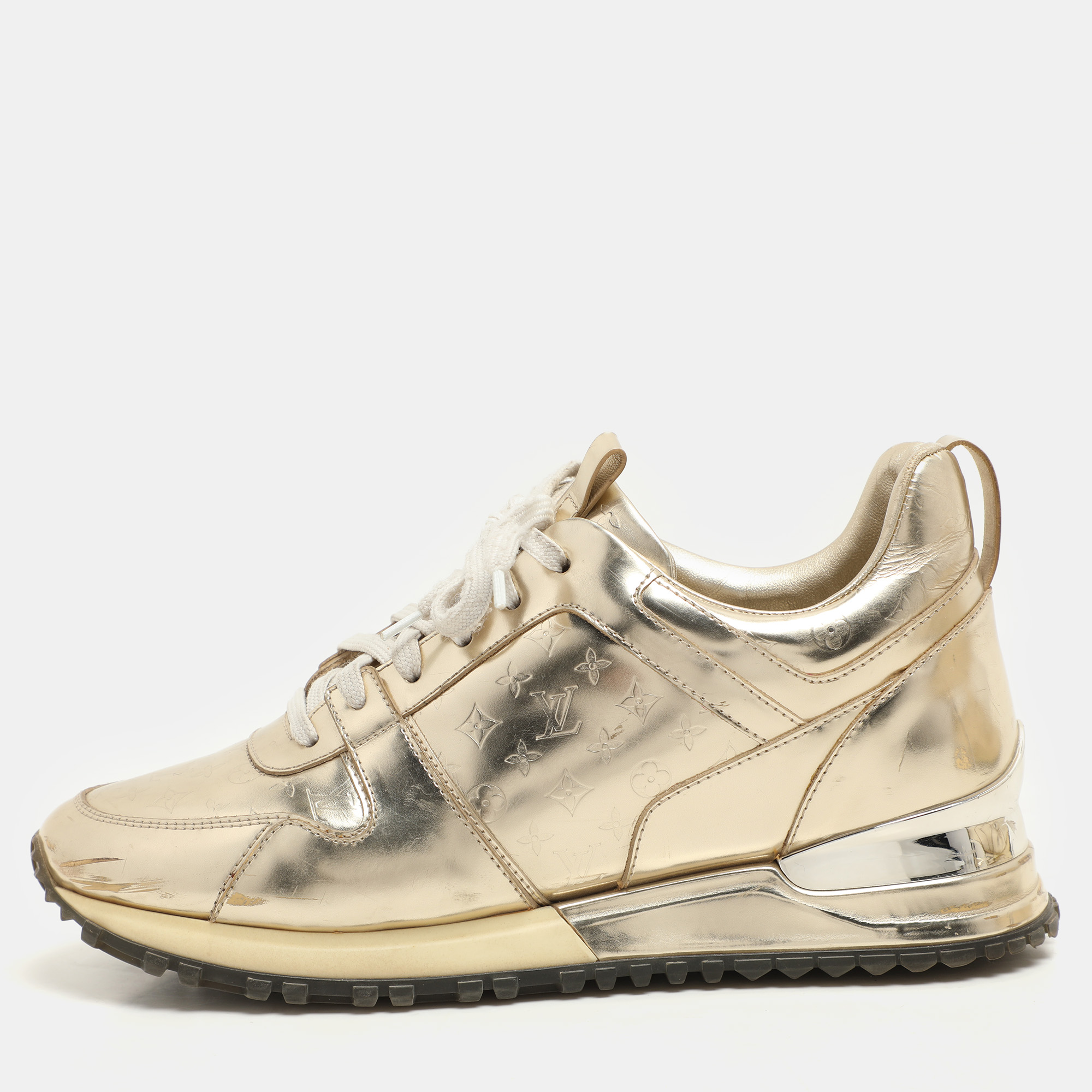 Louis Vuitton Gold Metalic Leather Run Away Low Top Sneakers Size 36
Louis Vuitton Gold Metalic Leather Run Away Low Top Sneakers Size 36