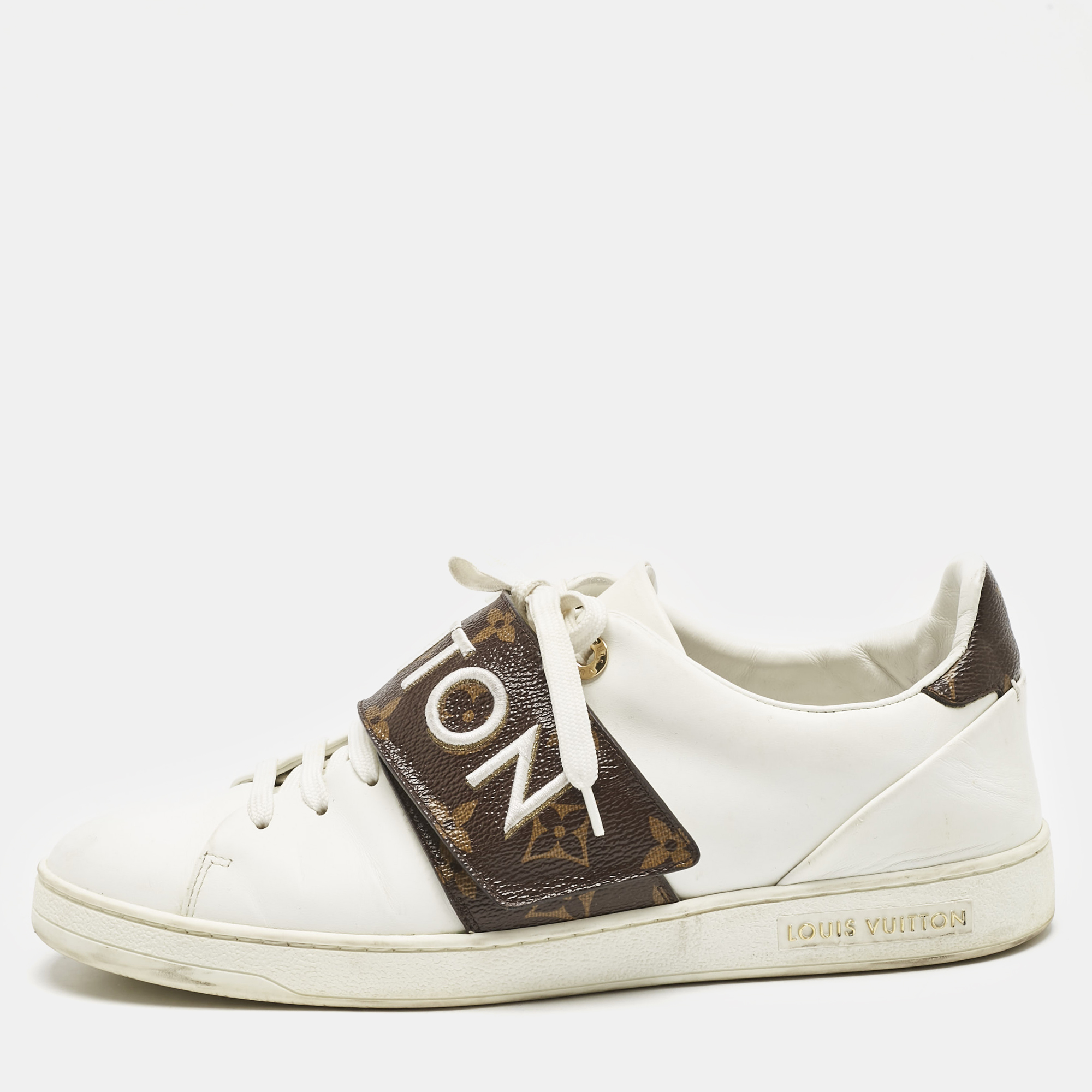 Louis Vuitton White/Brown Leather and Monogram Canvas Logo Strap Frontrow Sneakers Size
Louis Vuitton White/Brown Leather and Monogram Canvas Logo Strap Frontrow Sneakers Size