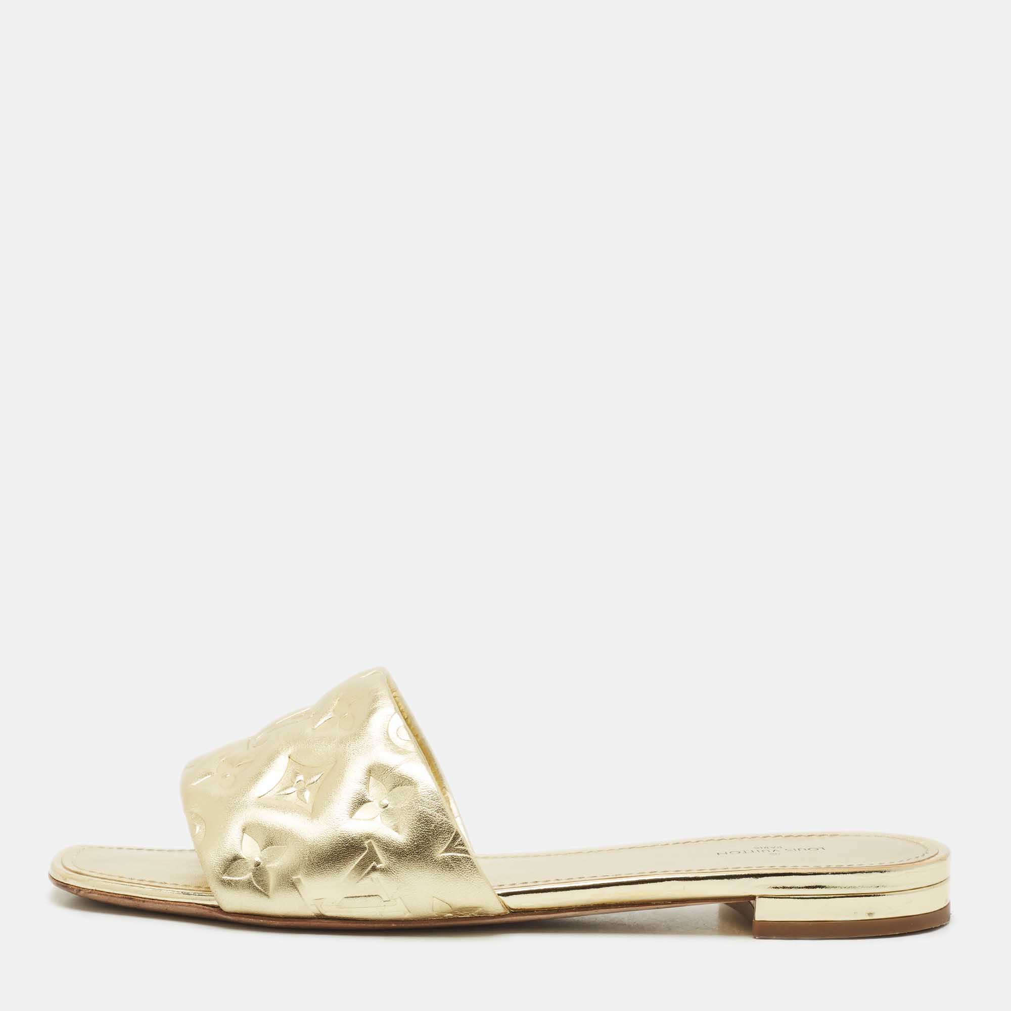 Louis Vuitton Gold Monogram Embossed Leather Revival Flat Slides Size
Louis Vuitton Gold Monogram Embossed Leather Revival Flat Slides Size