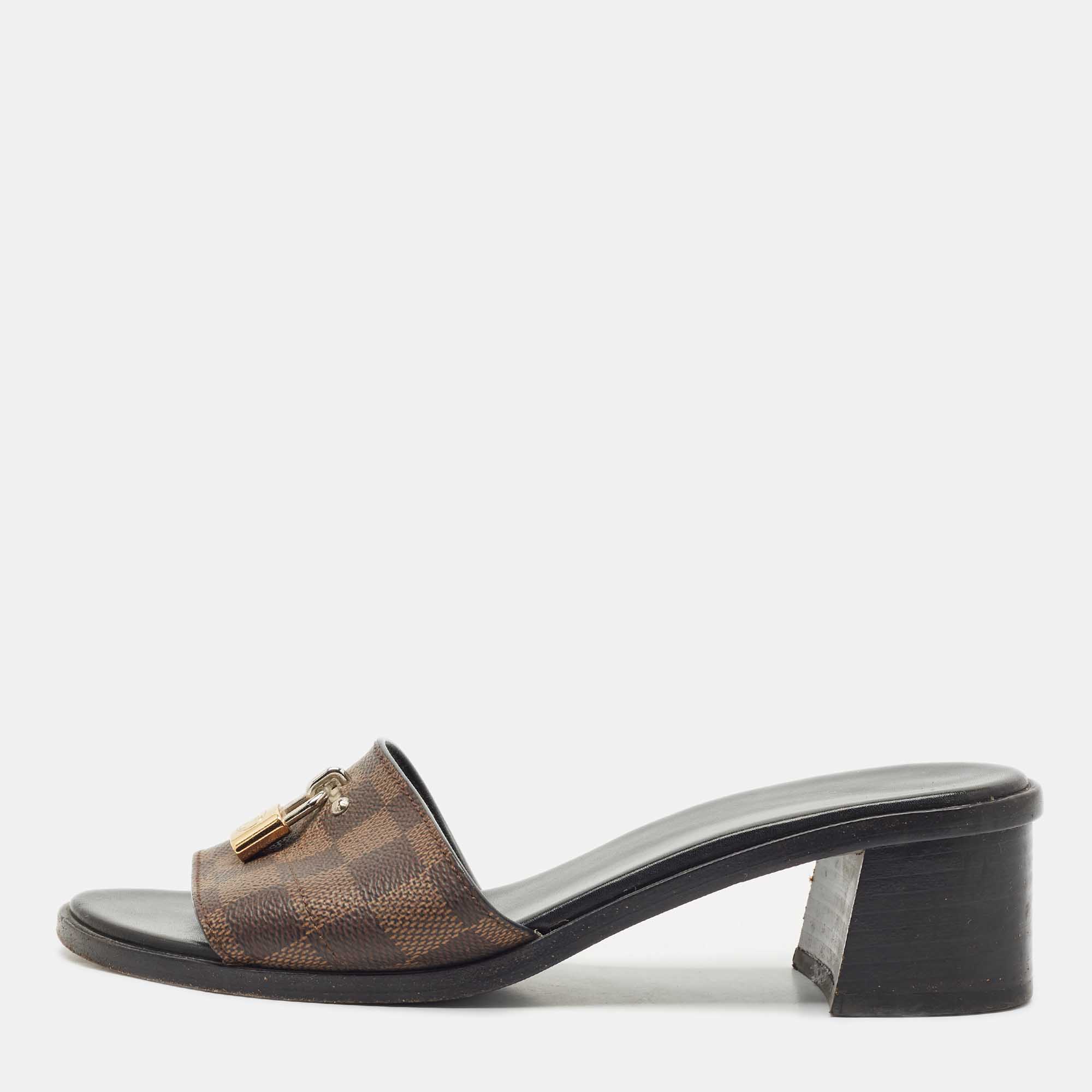 Louis Vuitton Damier Ebene Canvas Lock It Block Heel Slide Sandals Size, Brown
Louis Vuitton Damier Ebene Canvas Lock It Block Heel Slide Sandals Size, Brown