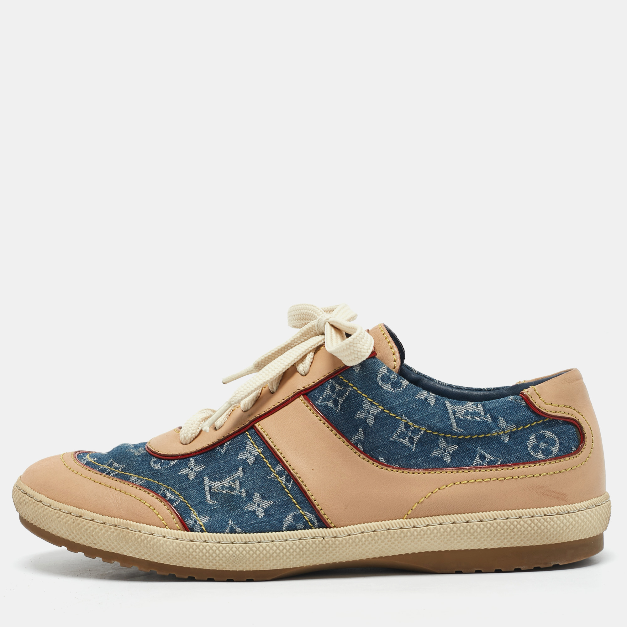 Louis Vuitton Blue/Beige Monogram Denim and Leather Low Top Sneakers Size
Louis Vuitton Blue/Beige Monogram Denim and Leather Low Top Sneakers Size