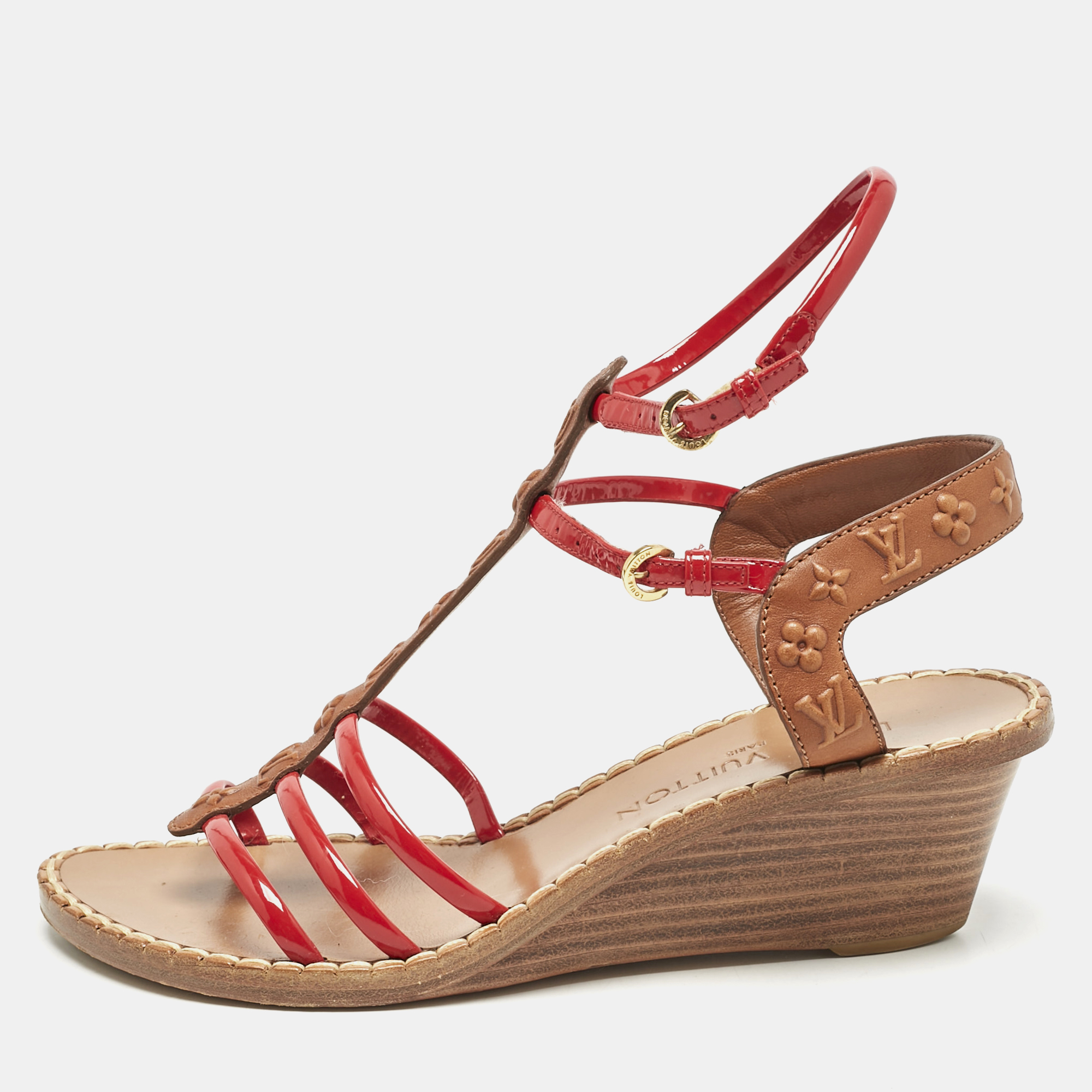 Louis Vuitton Brown/Red Monogram Embossed Leather and Patent T-Strap Wedge Sandals Size
Louis Vuitton Brown/Red Monogram Embossed Leather and Patent T-Strap Wedge Sandals Size