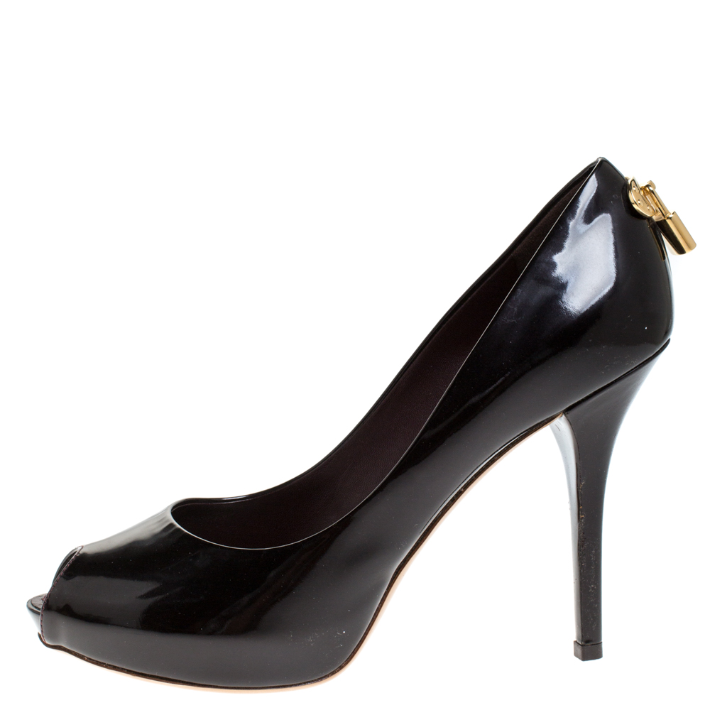Louis Vuitton Black Patent Leather Oh Really! Peep Toe Platform Pumps Size
Louis Vuitton Black Patent Leather Oh Really! Peep Toe Platform Pumps Size
