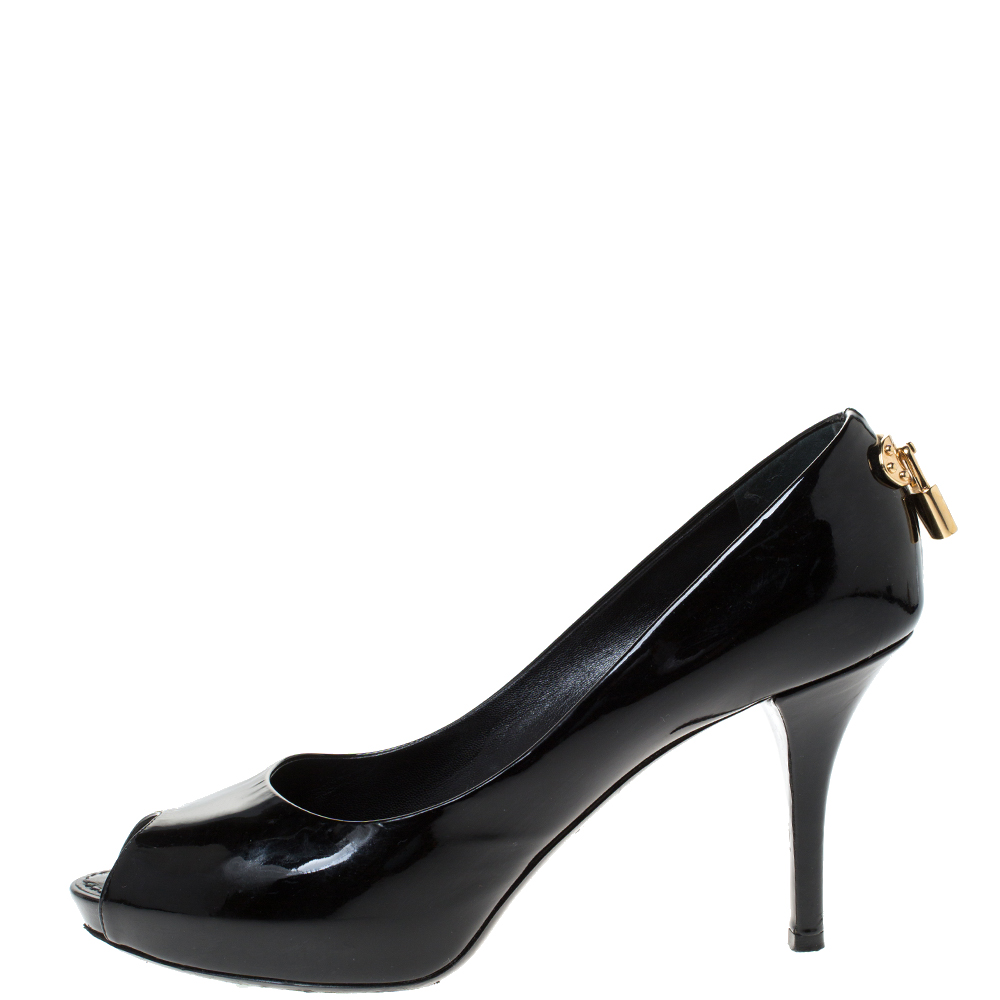 Louis Vuitton Black Patent Leather Oh Really! Peep Toe Platform Pumps Size
Louis Vuitton Black Patent Leather Oh Really! Peep Toe Platform Pumps Size