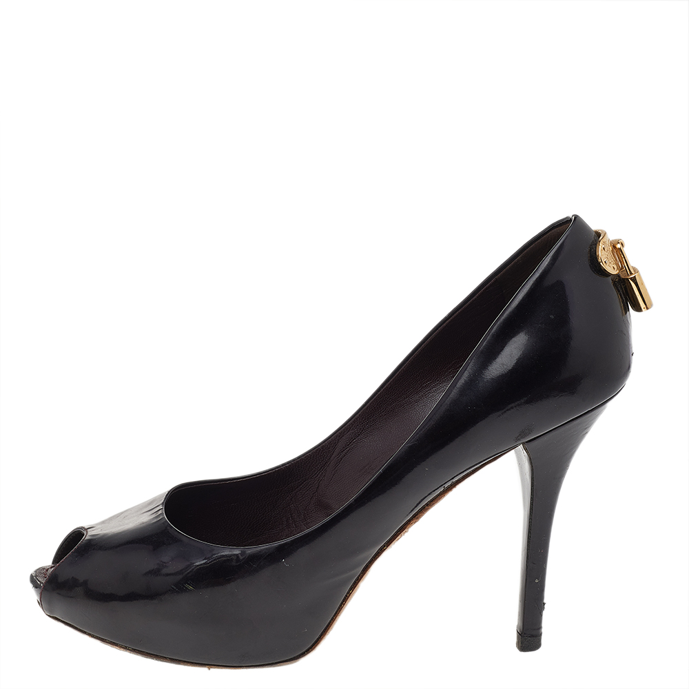 Louis Vuitton Black Patent Leather Oh Really! Peep Toe Platform Pumps Size
Louis Vuitton Black Patent Leather Oh Really! Peep Toe Platform Pumps Size