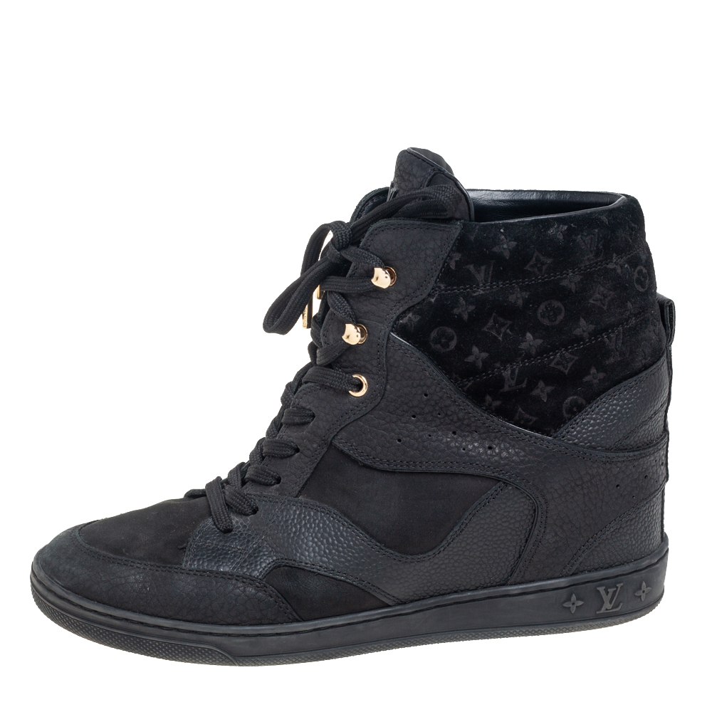 Louis Vuitton Black Monogram Empreinte Leather And Suede High Top Sneakers Size
Louis Vuitton Black Monogram Empreinte Leather And Suede High Top Sneakers Size