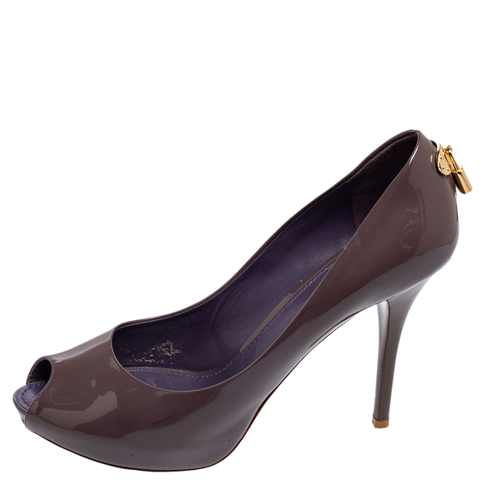 Louis Vuitton Purple Patent Leather Oh Really! Peep Toe Platform Pumps Size 
Louis Vuitton Purple Patent Leather Oh Really! Peep Toe Platform Pumps Size