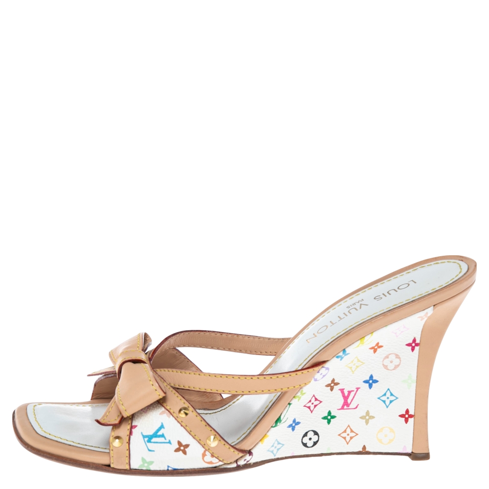 Louis Vuitton Multicolor Monogram Canvas and Leather Bow Wedge Sandals Size
Louis Vuitton Multicolor Monogram Canvas and Leather Bow Wedge Sandals Size
