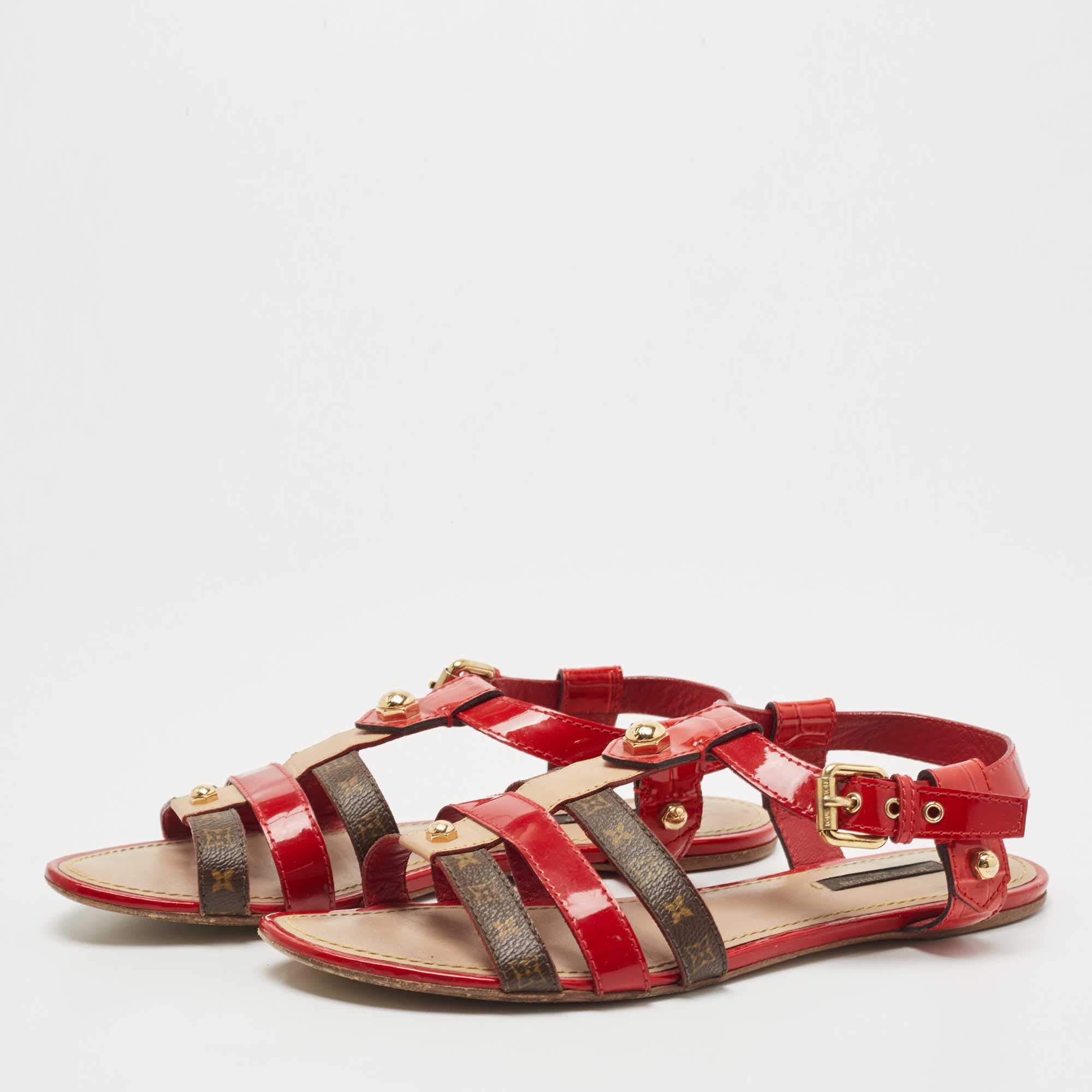 Louis Vuitton Tricolor Monogram Canvas and Patent Leather Ankle Strap Flat Sandals Size, Red
Louis Vuitton Tricolor Monogram Canvas and Patent Leather Ankle Strap Flat Sandals Size, Red