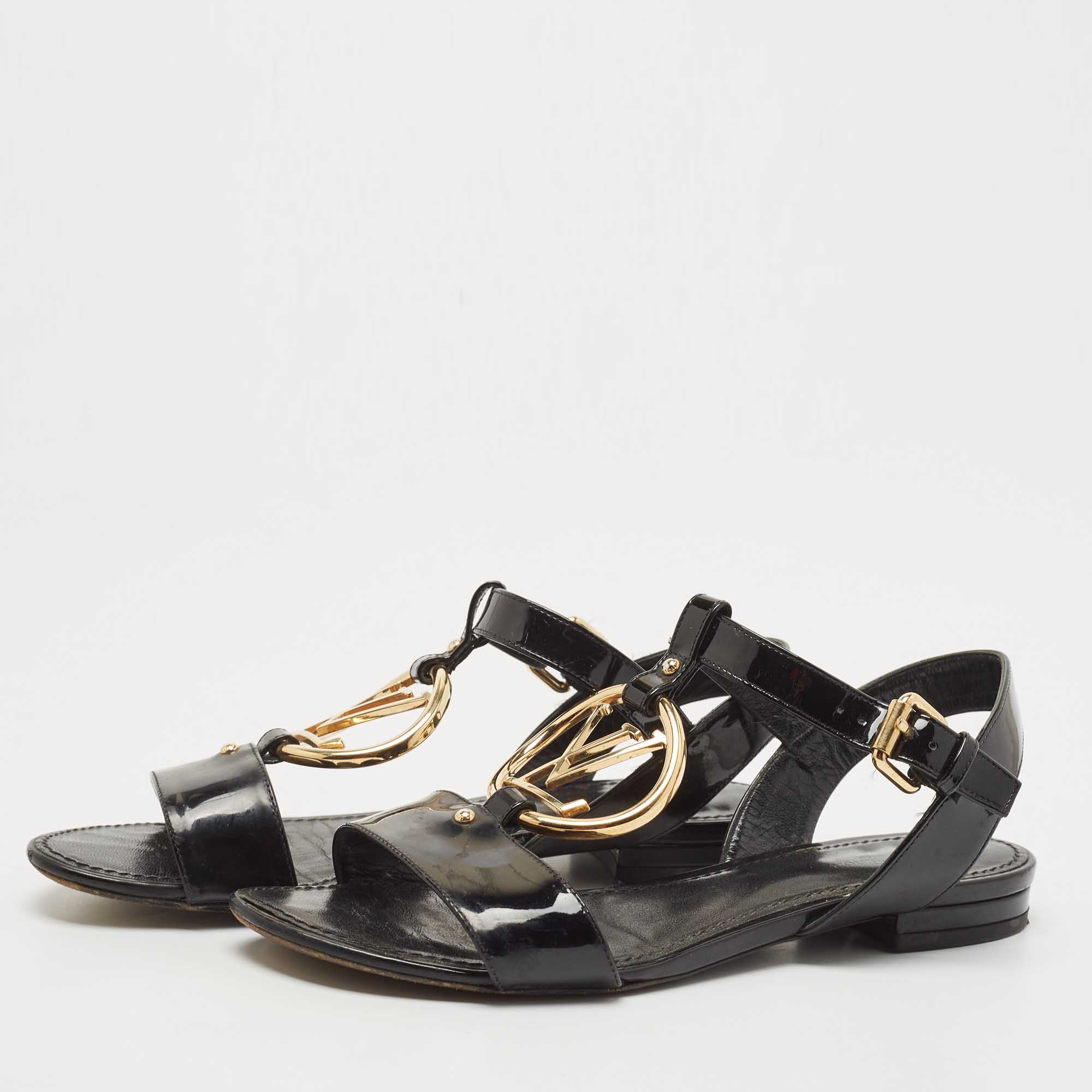 Louis Vuitton Black Patent Leather Logo Ankle Strap Flat Sandals Size
Louis Vuitton Black Patent Leather Logo Ankle Strap Flat Sandals Size