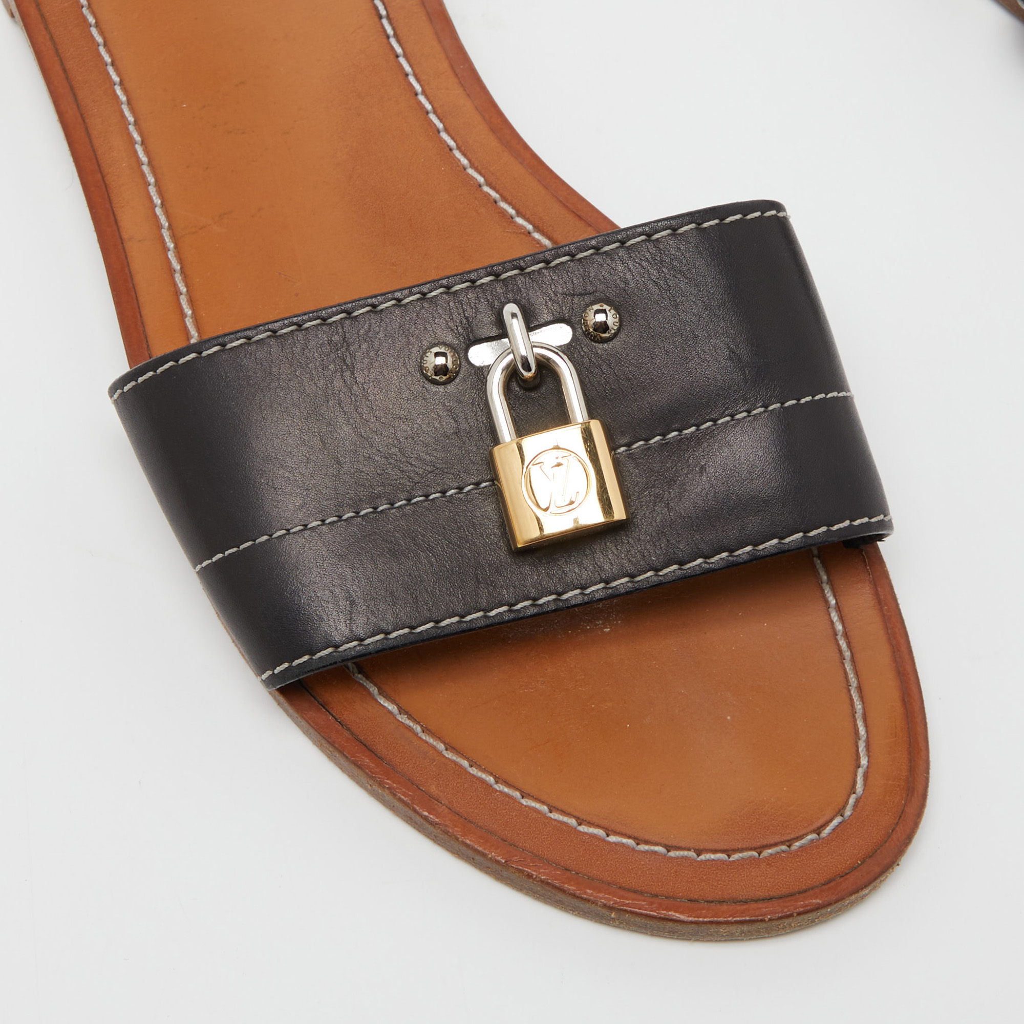 Louis Vuitton Black Leather Lock It Flat Slides Size 38