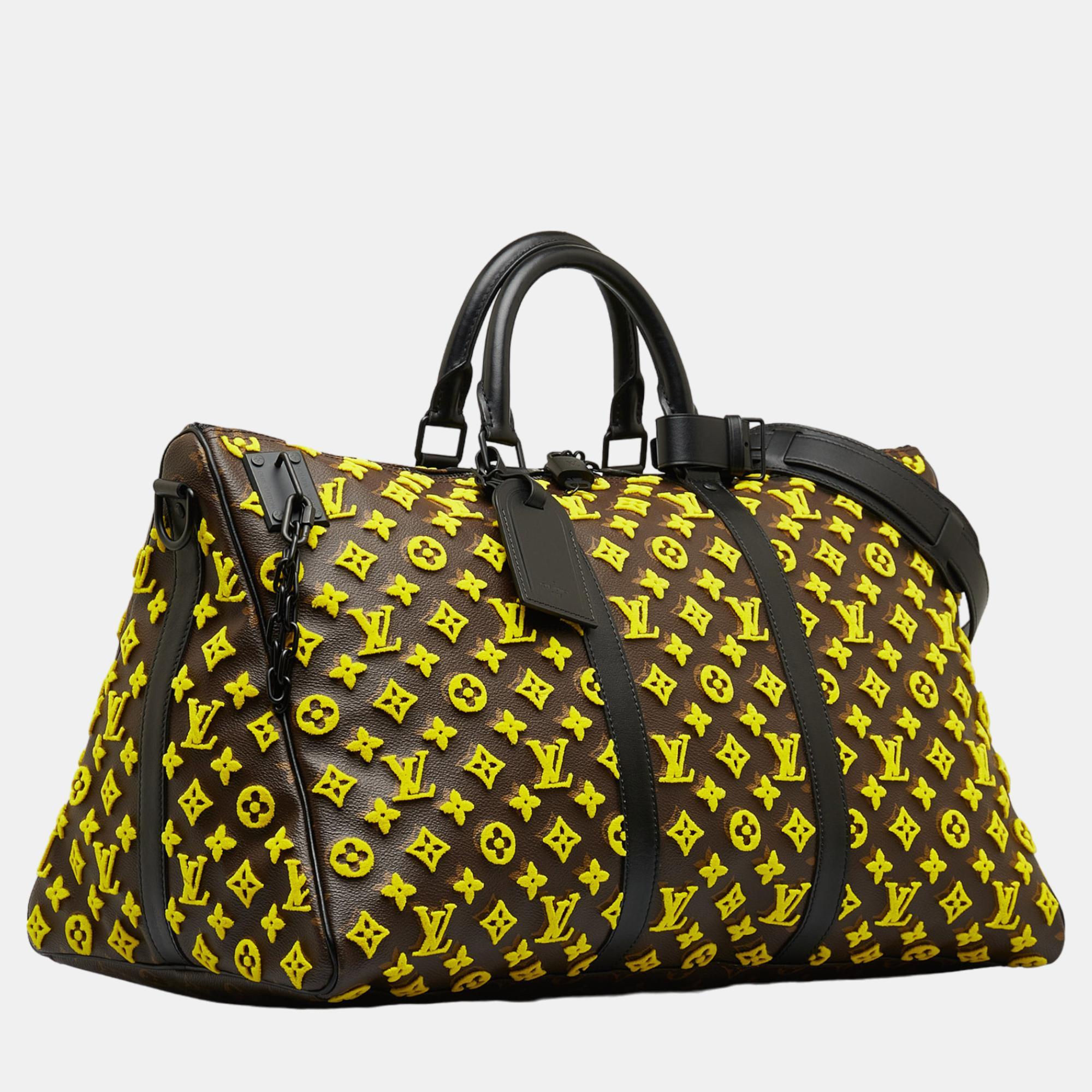 Louis Vuitton Yellow Monogram Tuffetage Triangle Keepall Bandouliere 50
Louis Vuitton Yellow Monogram Tuffetage Triangle Keepall Bandouliere 50
