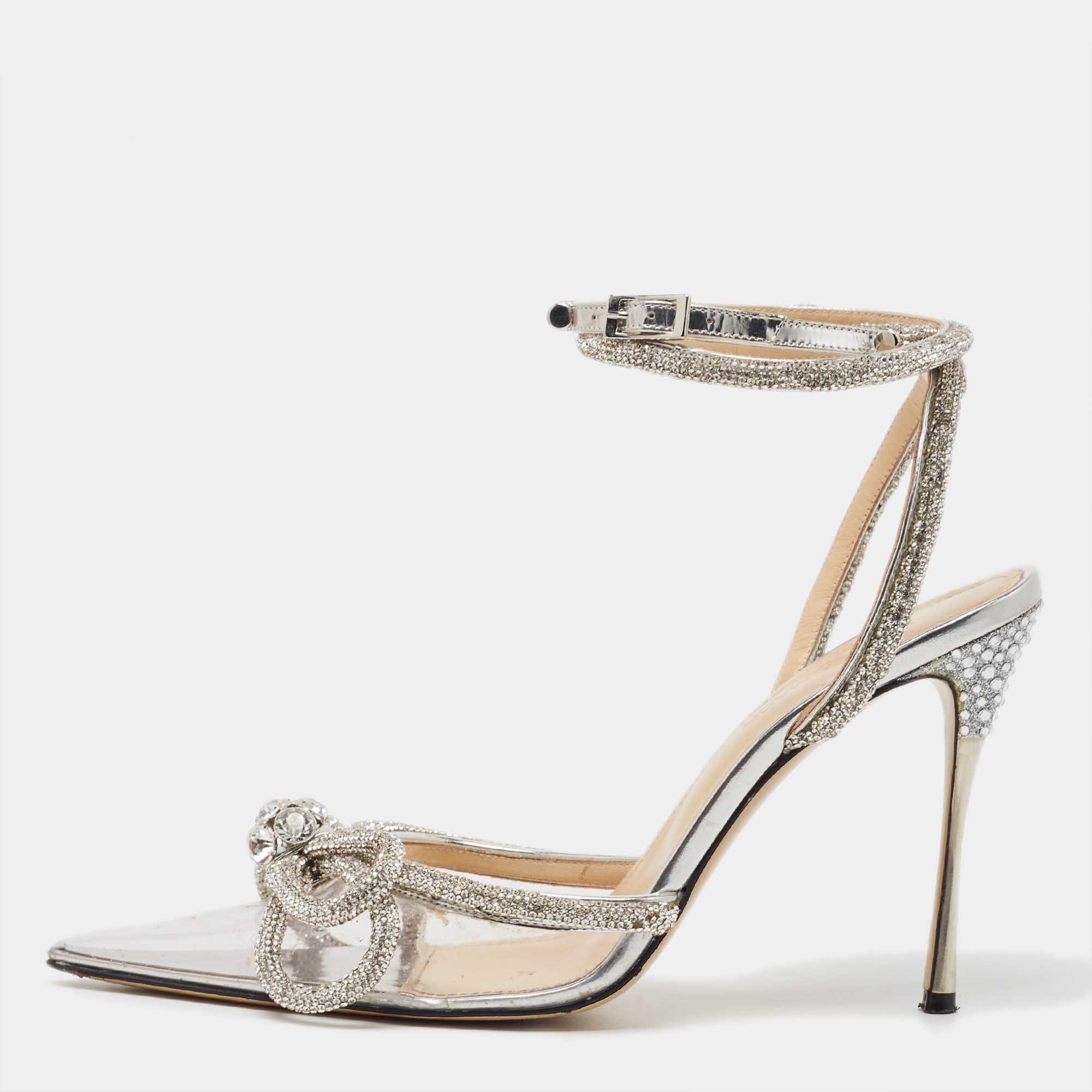 Mach & Mach Silver Patent Leather and PVC Double Bow Ankle Wrap Pumps Size
Mach & Mach Silver Patent Leather and PVC Double Bow Ankle Wrap Pumps Size
