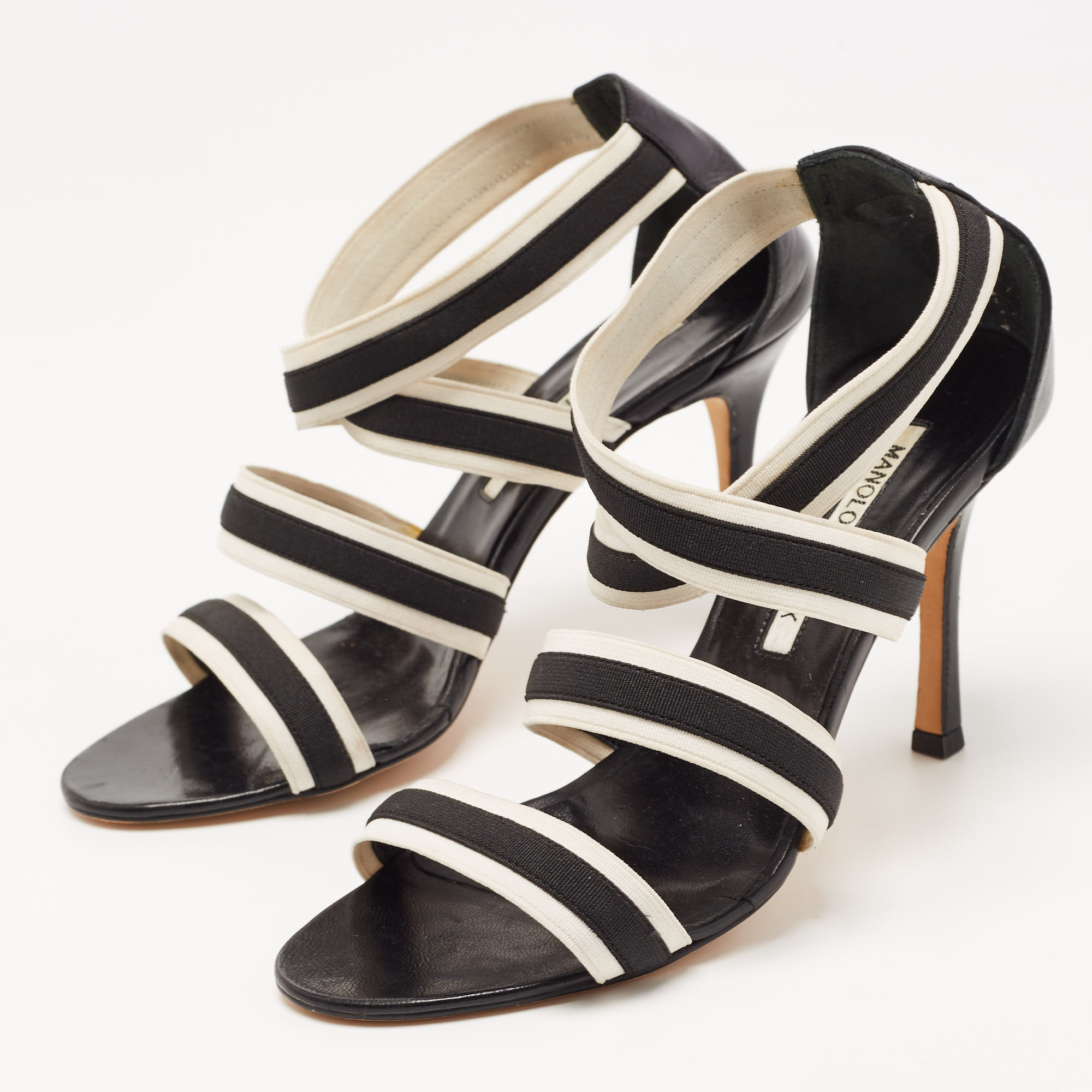 Manolo Blahnik Black/White Striped Elastic and Leather Ankle Strap Sandals Size
Manolo Blahnik Black/White Striped Elastic and Leather Ankle Strap Sandals Size