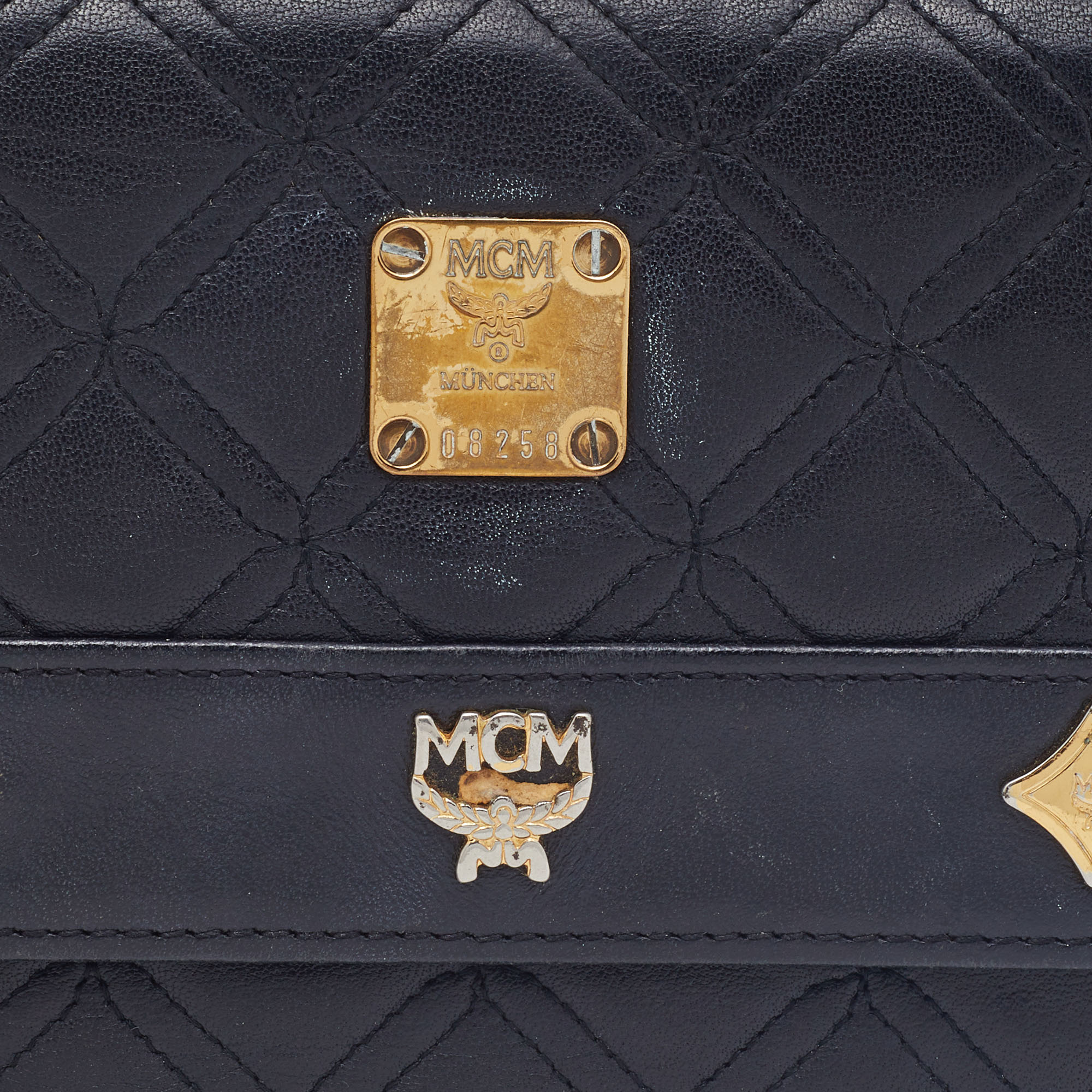 MCM Black Quilted Leather Embellished Flap Compact Wallet