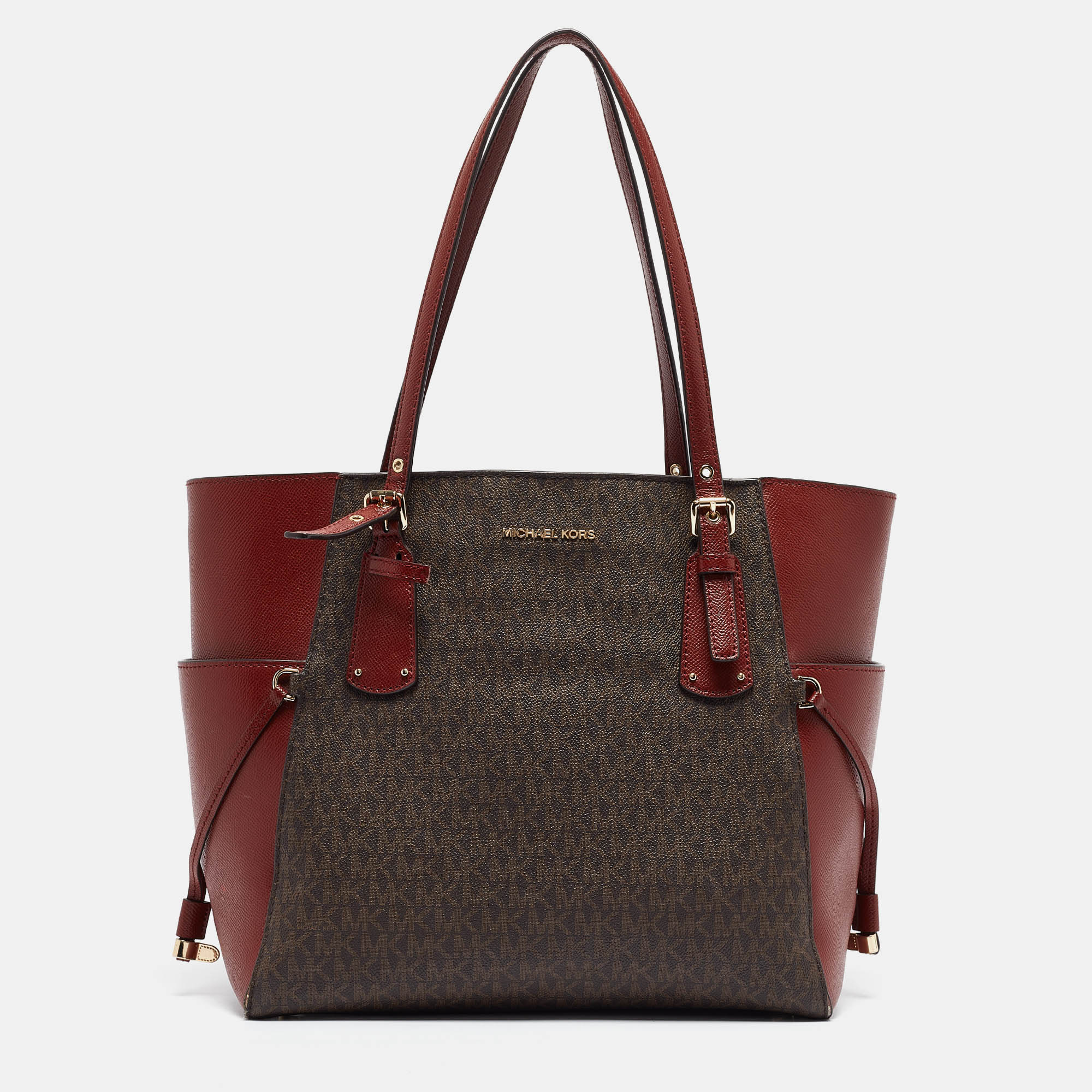 Michael kors red/brown signature coated canvas and leather voyager east west tote