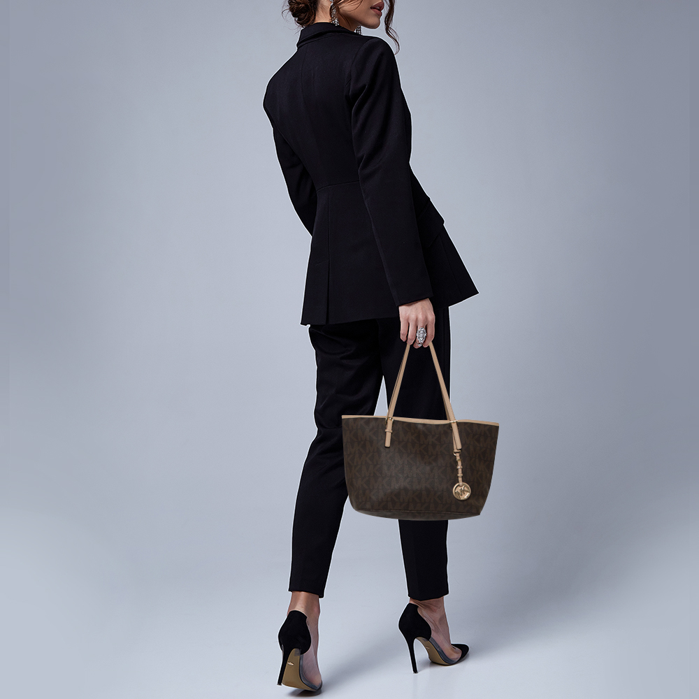 Michael Kors Brown/Beige Signature Coated Canvas and Leather Small Jet Set Travel Tote
Michael Kors Brown/Beige Signature Coated Canvas and Leather Small Jet Set Travel Tote
