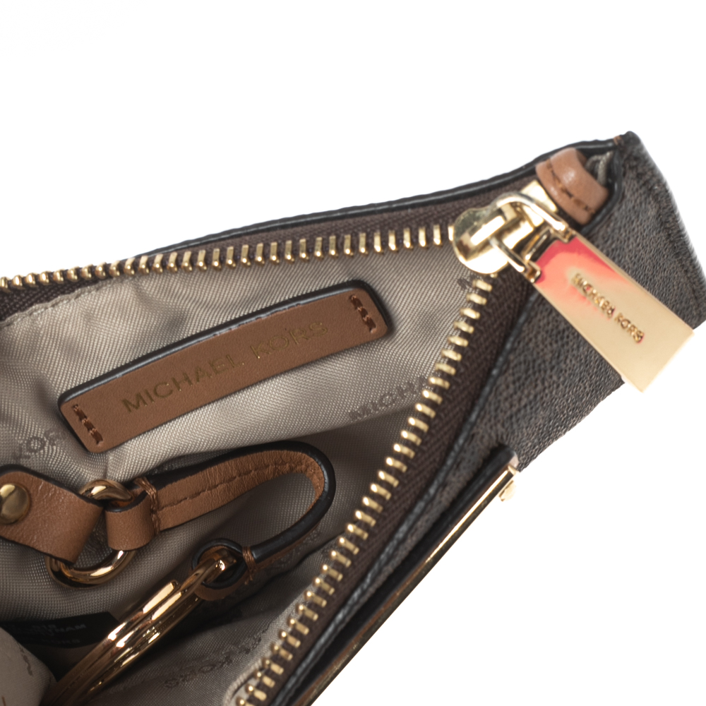 Michael Kors Brown Signature Coated Canvas and Leather Logo Zip Coin Purse
Michael Kors Brown Signature Coated Canvas and Leather Logo Zip Coin Purse