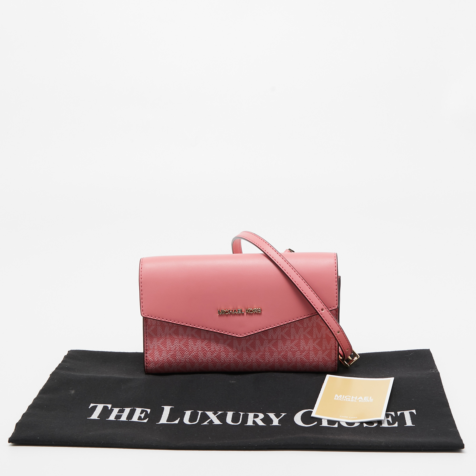 Michael Kors Pink Signature Coated Canvas And Leather Envelope Flap Clutch Bag