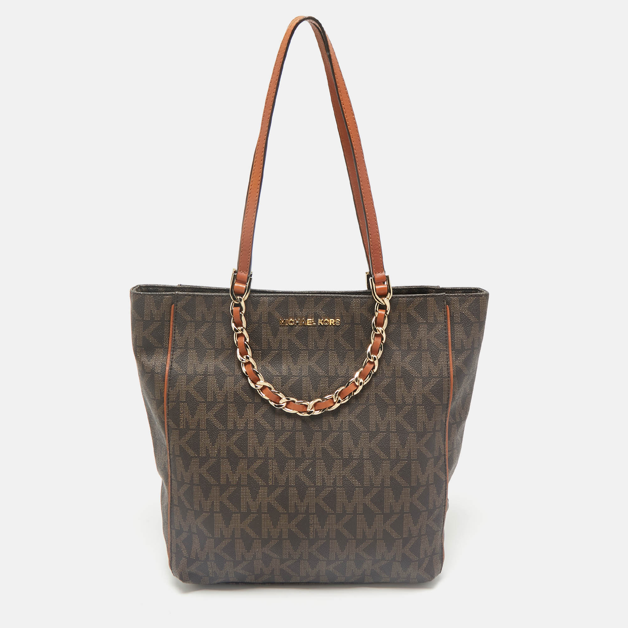 MICHAEL Michael Kors Brown Signature Coated Canvas North/South Harper Tote
MICHAEL Michael Kors Brown Signature Coated Canvas North/South Harper Tote