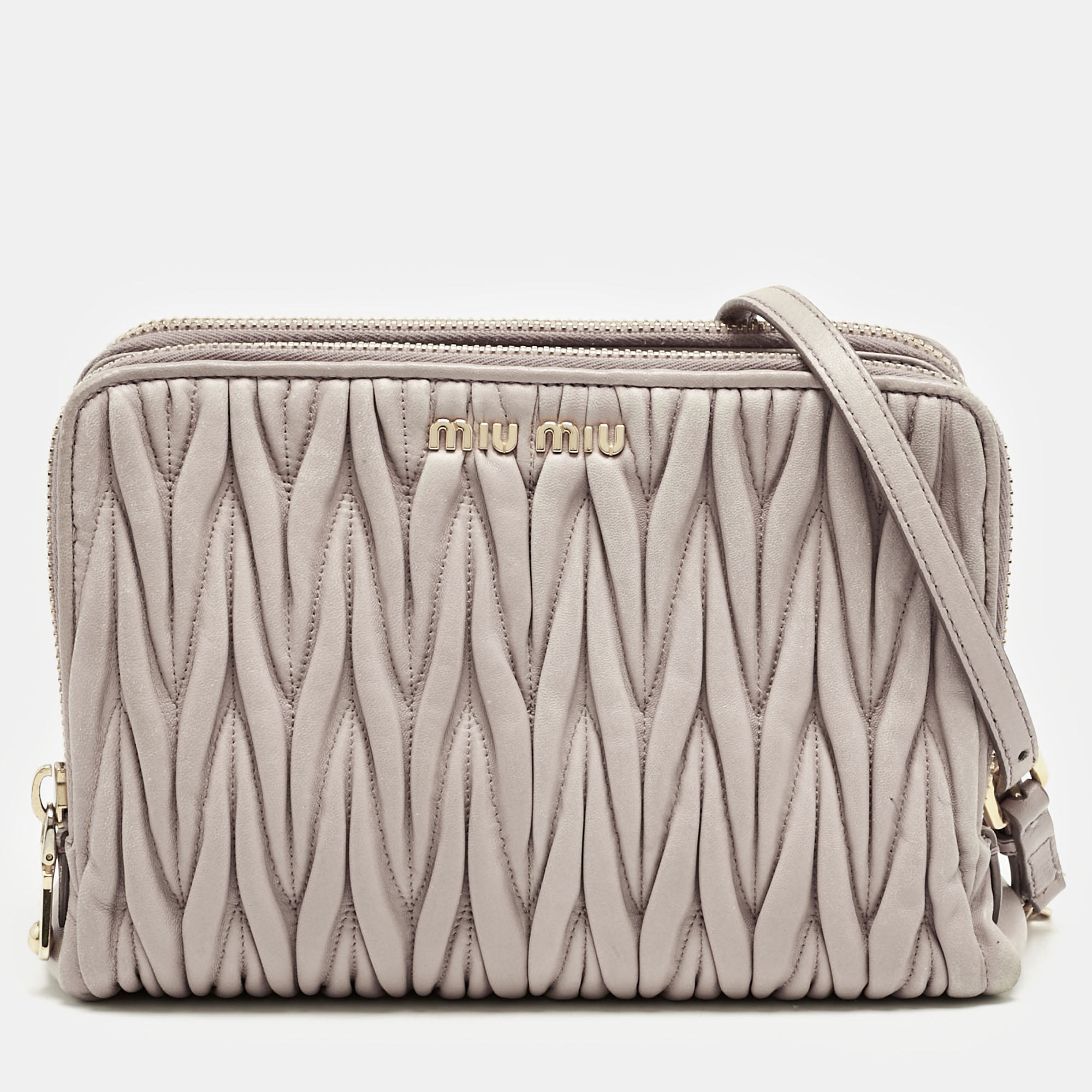 Miu Miu Beige Matelassé Leather Double Zip Camera Crossbody Bag
Miu Miu Beige Matelassé Leather Double Zip Camera Crossbody Bag