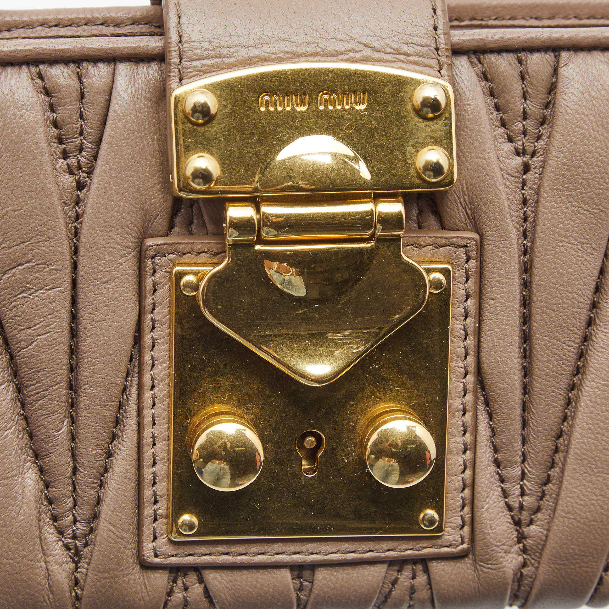 Miu Miu Beige Matelassé Leather Key Lock Continental Wallet
