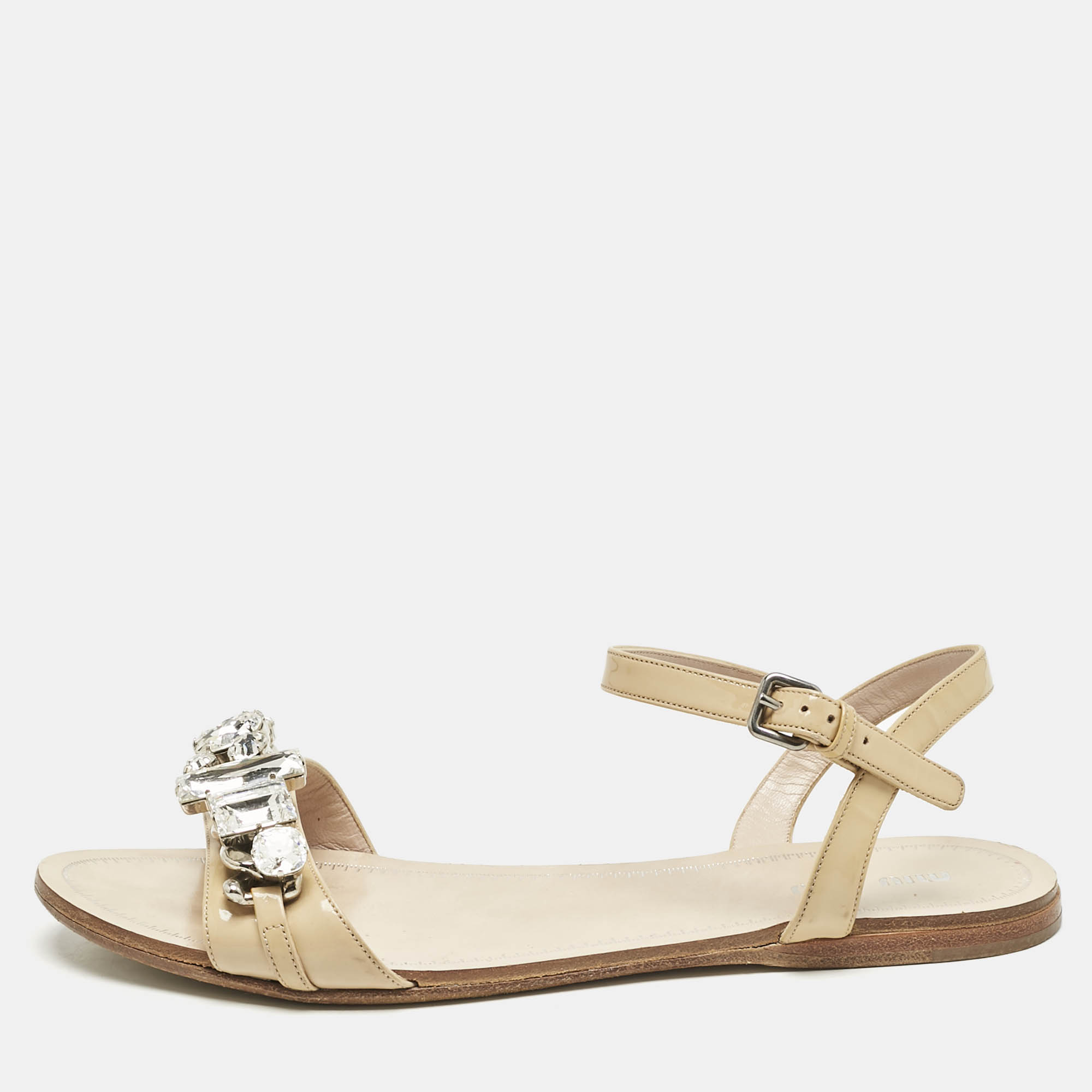 Miu Miu Beige Patent Leather Cipraia Crystal Ankle Strap Flat Sandals Size
Miu Miu Beige Patent Leather Cipraia Crystal Ankle Strap Flat Sandals Size