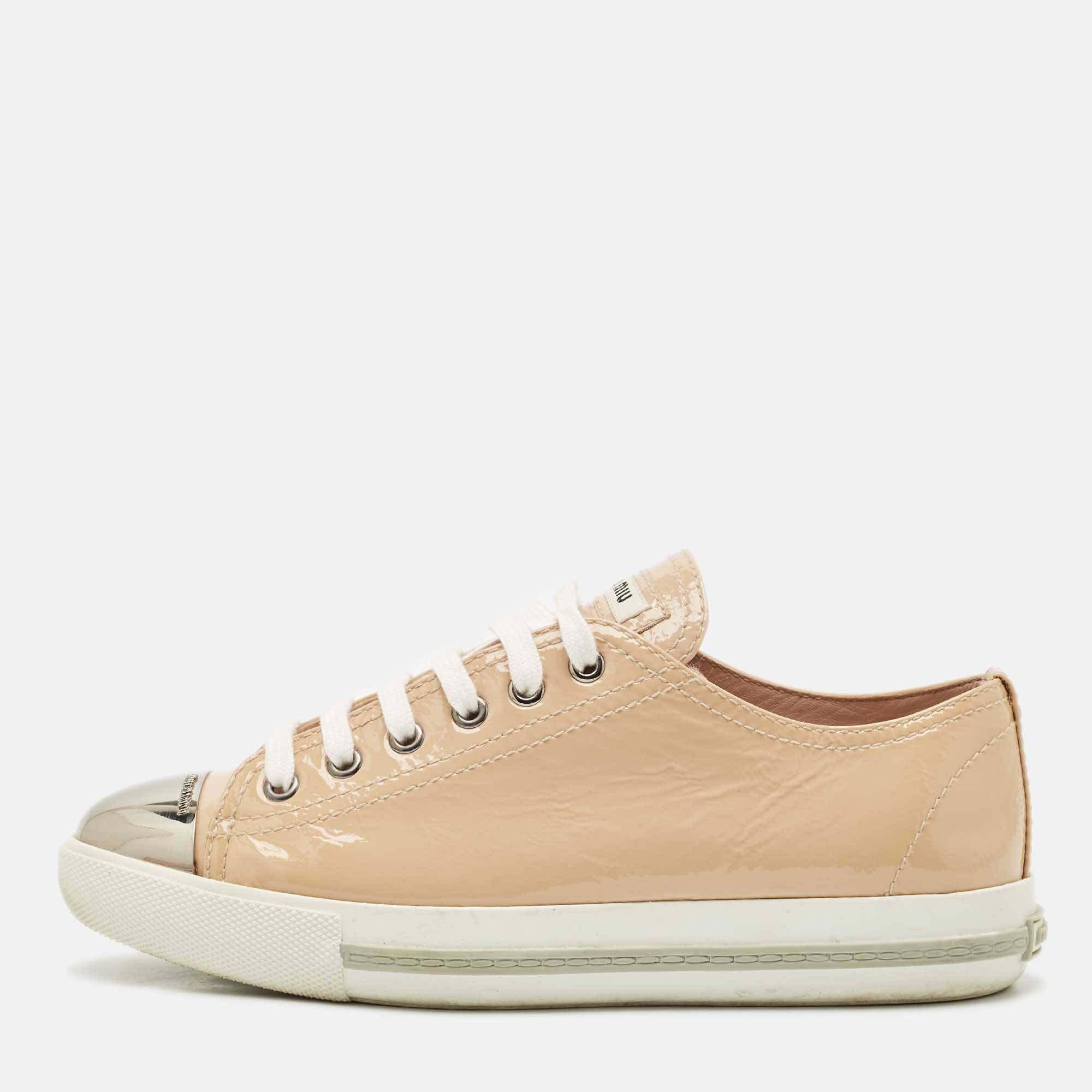 Miu Miu Beige Patent Leather Metal Cap Toe Low Top Sneakers Size
Miu Miu Beige Patent Leather Metal Cap Toe Low Top Sneakers Size