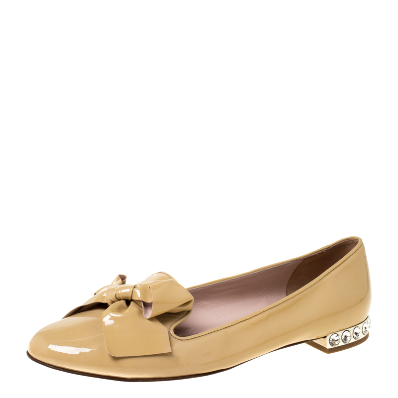 Image of Miu Miu Beige Patent Leather Studded Bow Loafers Size