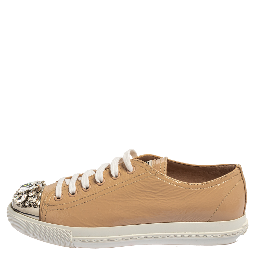 Miu Miu Beige Patent Leather Crystal Embellished Cap Toe Sneakers Size
Miu Miu Beige Patent Leather Crystal Embellished Cap Toe Sneakers Size
