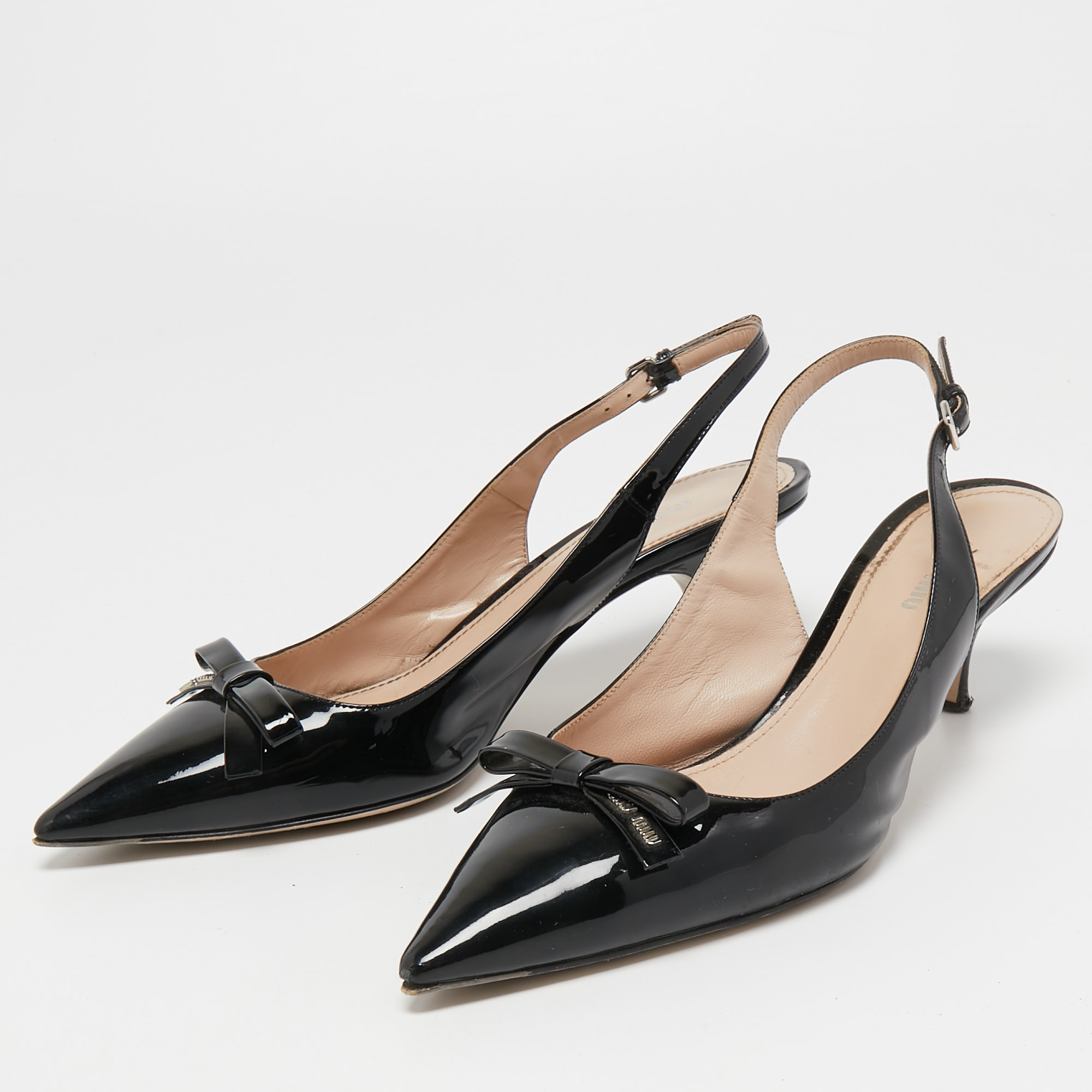 Miu Miu Black Patent Leather Bow Pointed Toe Slingback Pumps Size
Miu Miu Black Patent Leather Bow Pointed Toe Slingback Pumps Size