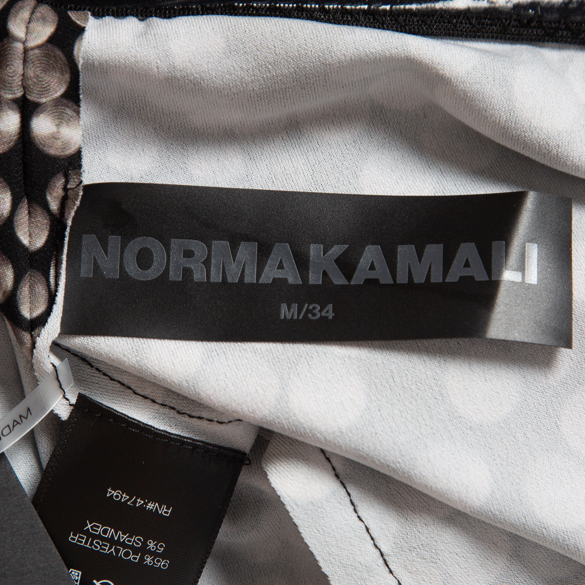 Norma Kamali Black Print Stretch Knit Footie Leggings M