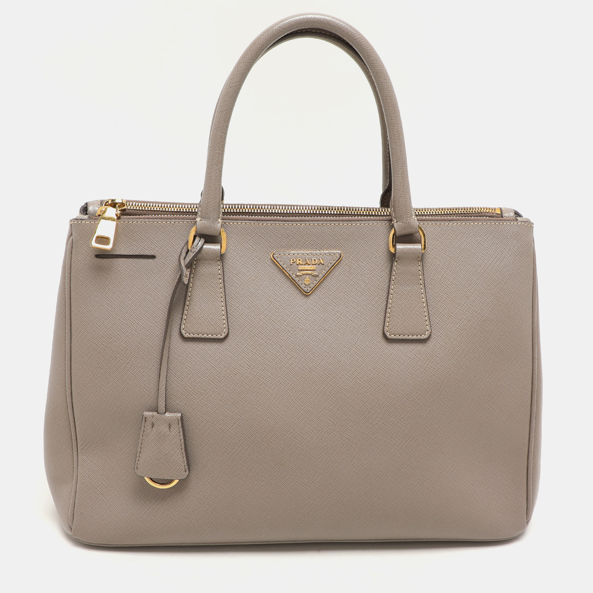 Prada Taupe Saffiano Lux Leather Large Galleria Double Zip Tote, Grey
Prada Taupe Saffiano Lux Leather Large Galleria Double Zip Tote, Grey