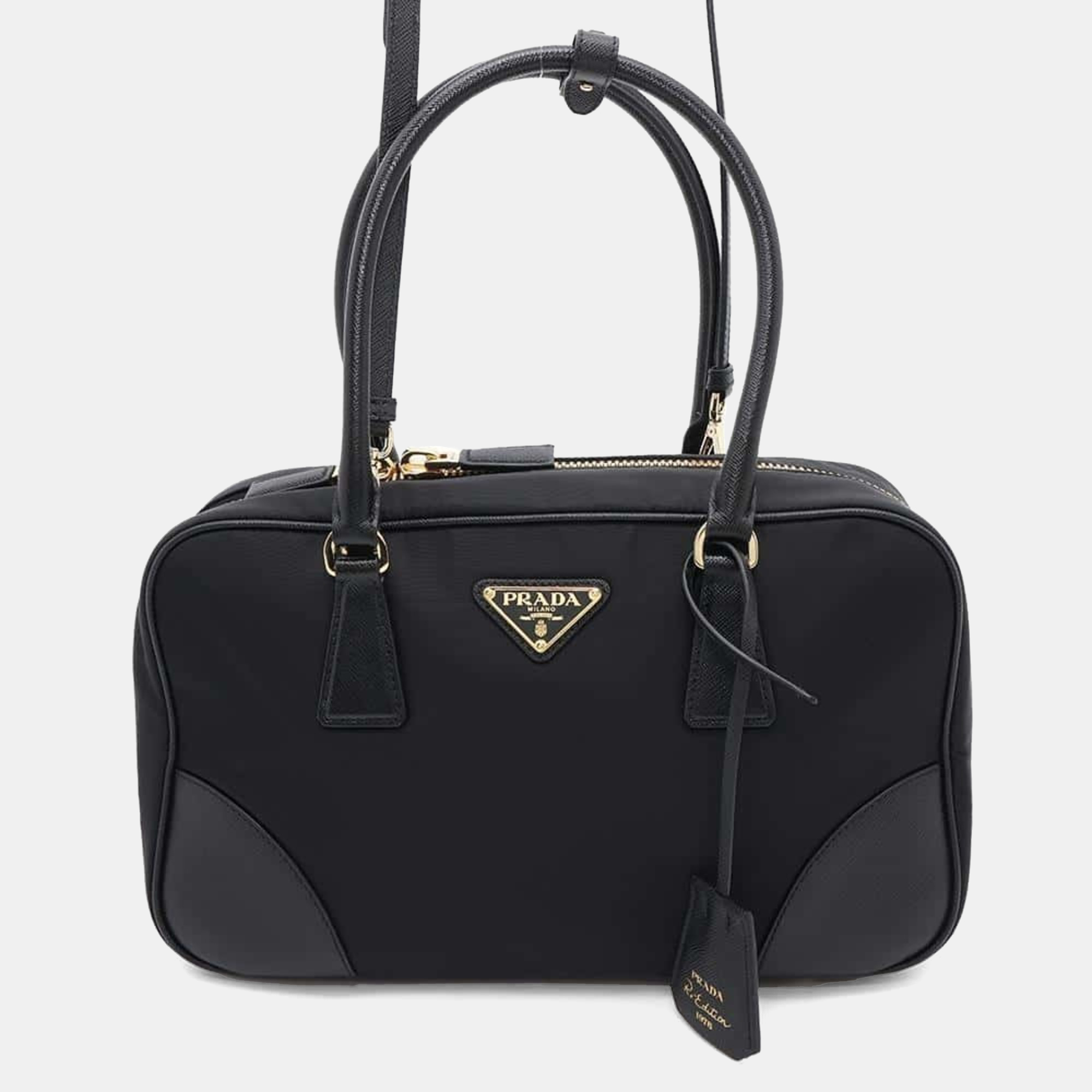 Prada Re-Edition 1978 Medium Double Handle Bag Nylon Saffiano Leather Black
Prada Re-Edition 1978 Medium Double Handle Bag Nylon Saffiano Leather Black