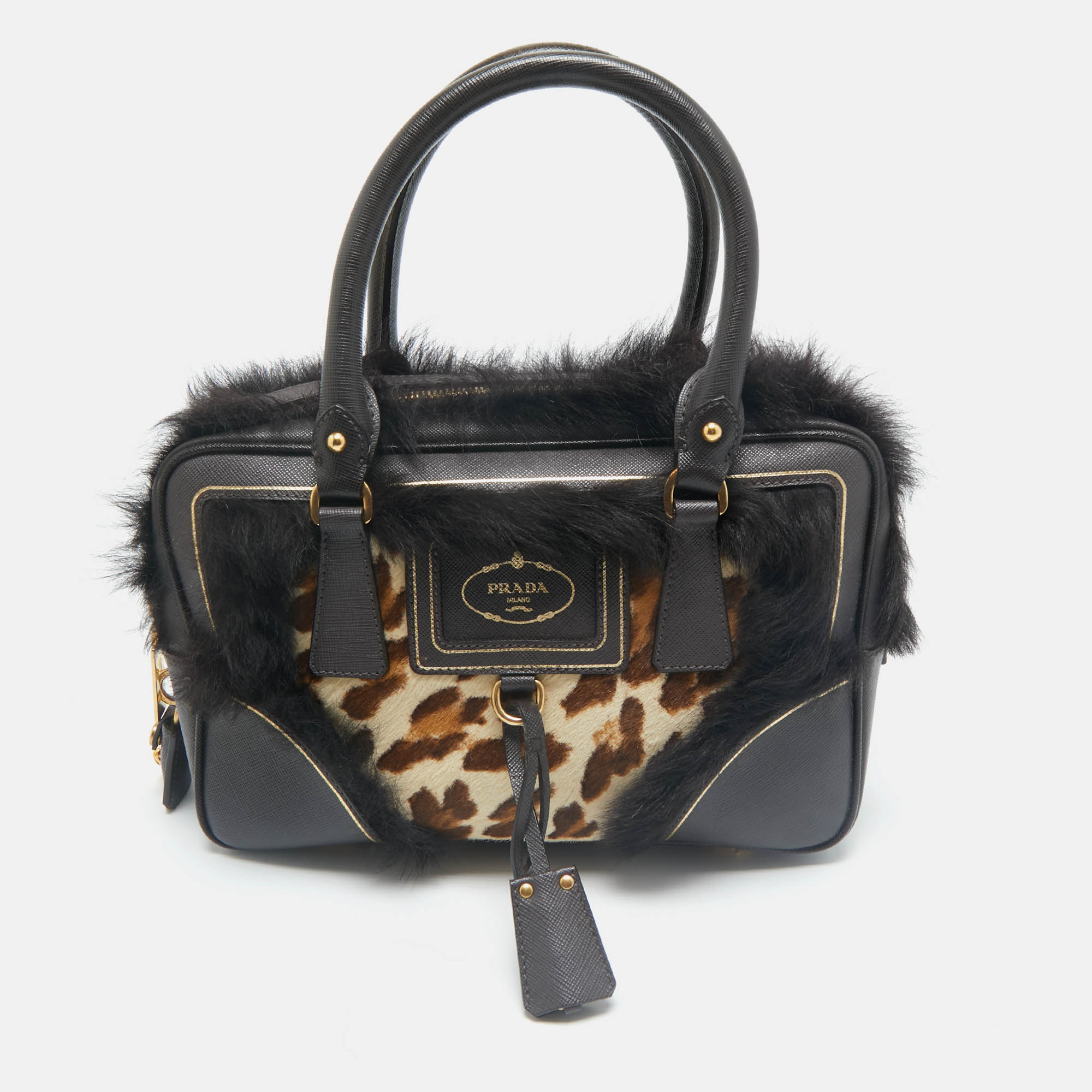Prada Dark Brown/Beige Leopard Print Calfhair, Leather and Fur Bowler Bag
Prada Dark Brown/Beige Leopard Print Calfhair, Leather and Fur Bowler Bag