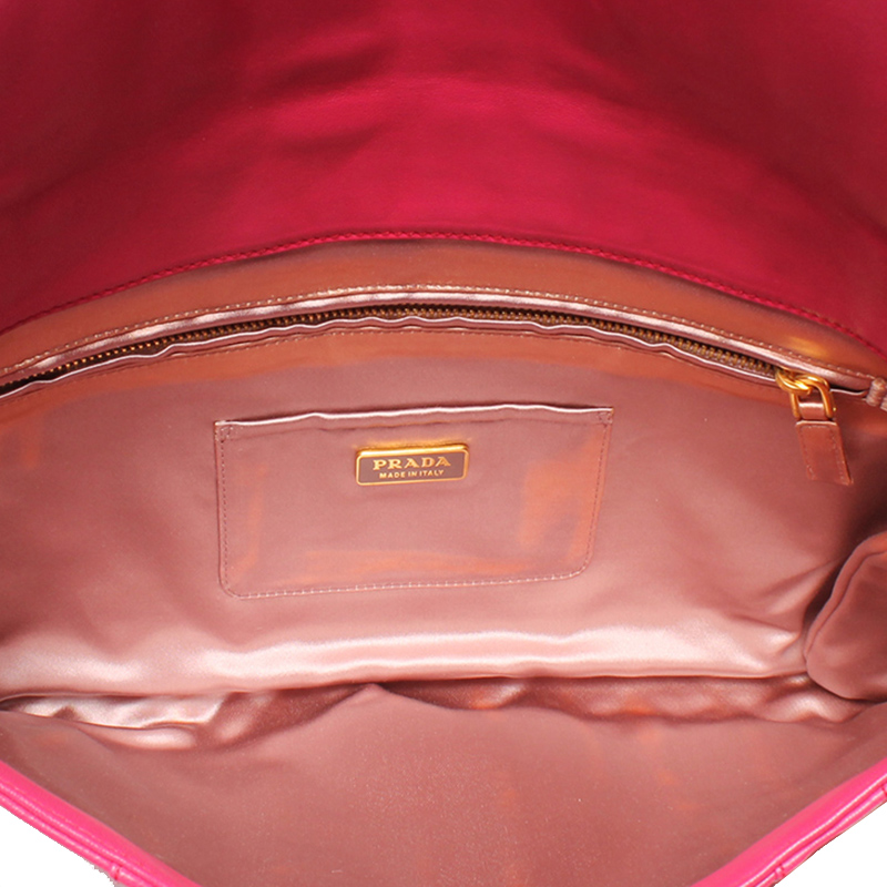 prada pink clutch bag