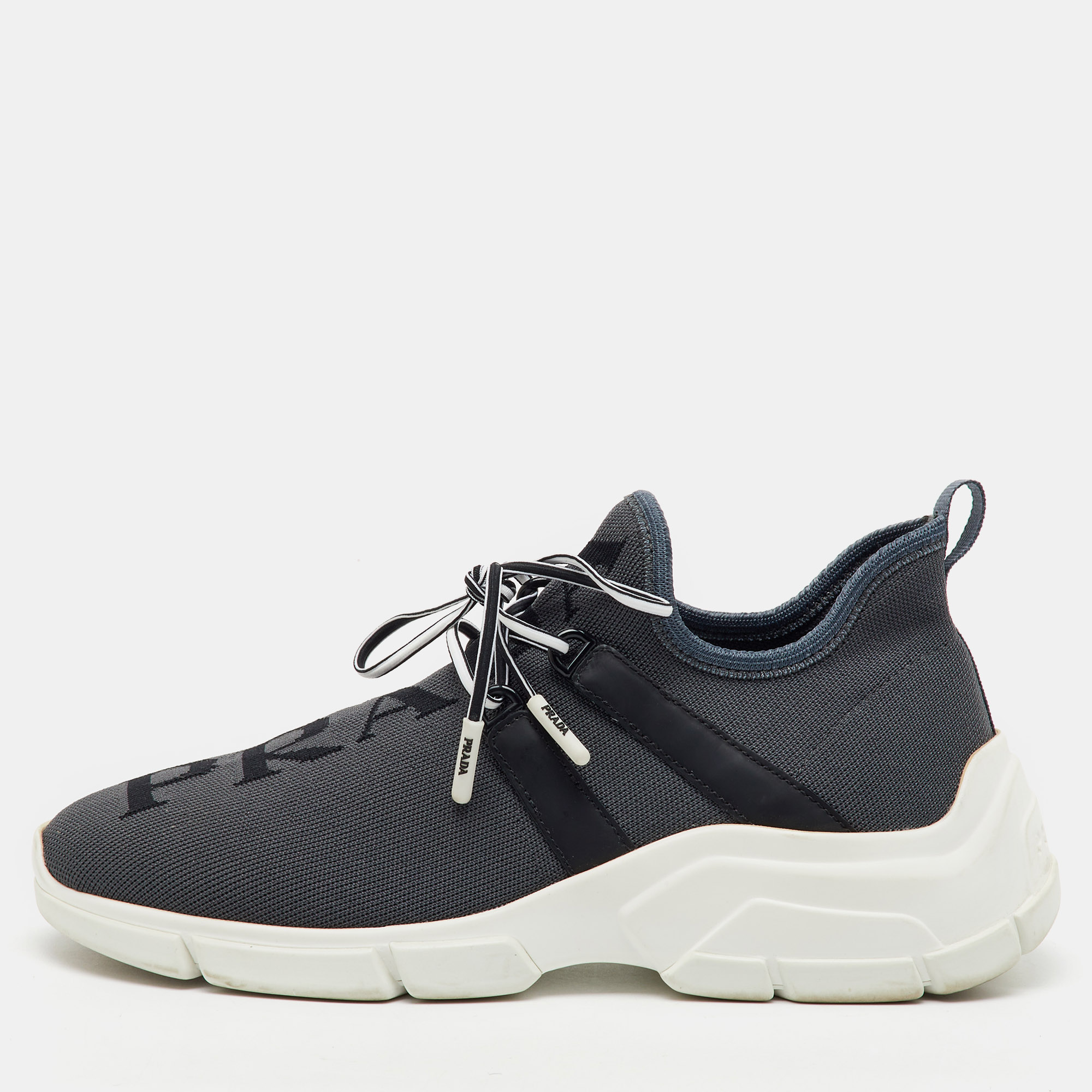 Prada Grey/Black Knit Fabric and Leather Logo Print Low Top Sneakers Size
Prada Grey/Black Knit Fabric and Leather Logo Print Low Top Sneakers Size