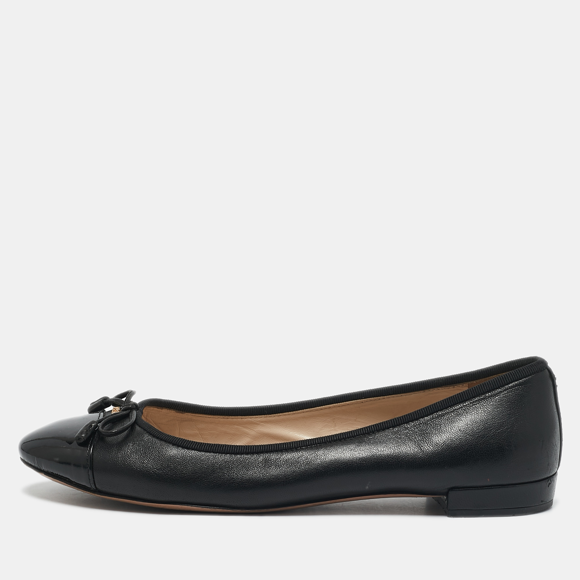 Prada Black Leather and Patent Leather Cap Toe Bow Ballet Flats Size
Prada Black Leather and Patent Leather Cap Toe Bow Ballet Flats Size