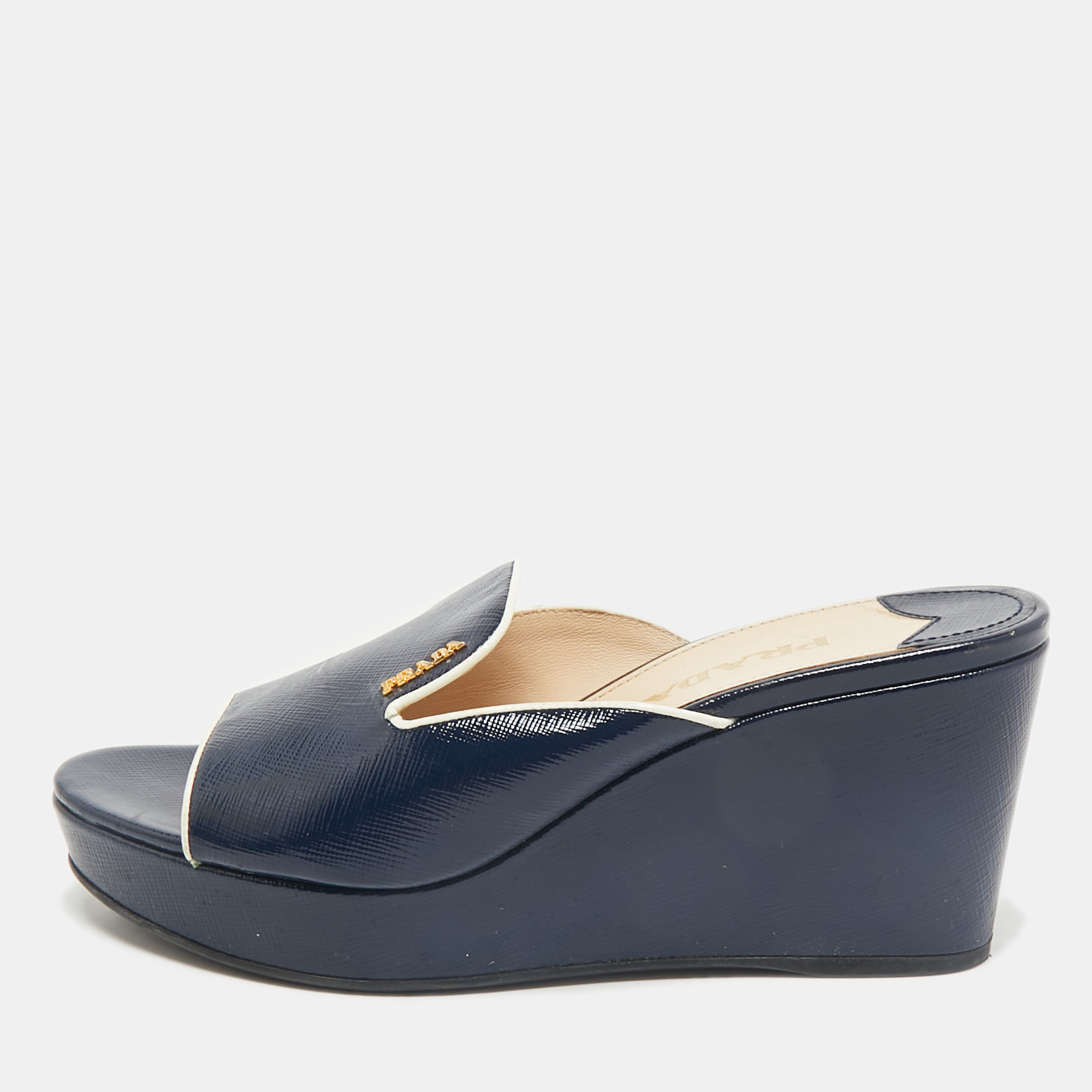 Prada Navy Blue Saffiano Patent Leather Wedge Platform Slide Sandals Size
Prada Navy Blue Saffiano Patent Leather Wedge Platform Slide Sandals Size