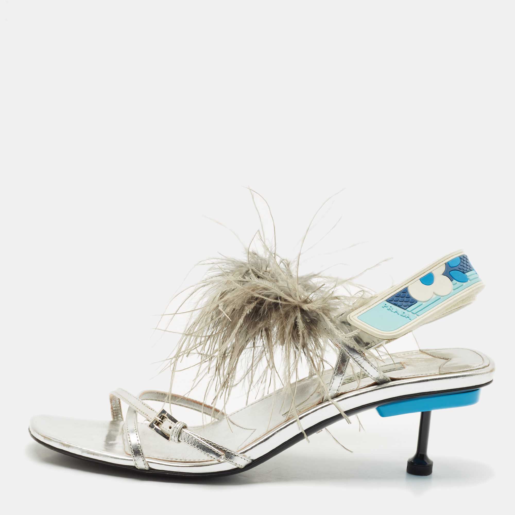 Prada Metallic Silver Leather and Ostrich Feather Ankle Strap Sandals Size
Prada Metallic Silver Leather and Ostrich Feather Ankle Strap Sandals Size