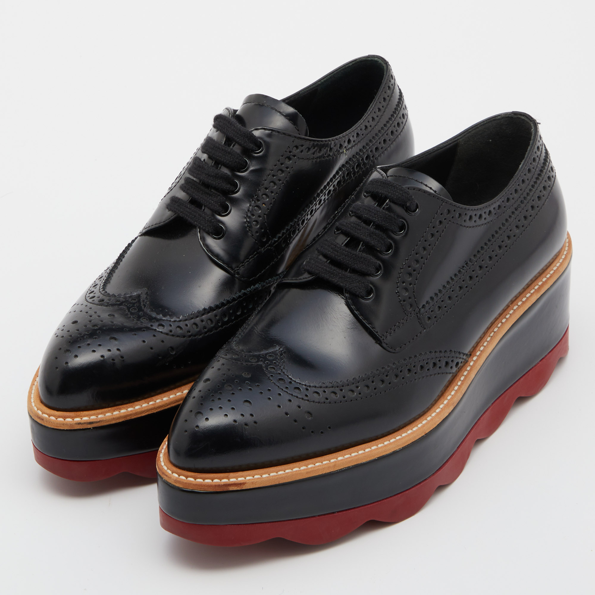 

Prada Black Brogue Patent Leather Wave Wingtip Platform Derby Sneakers Size