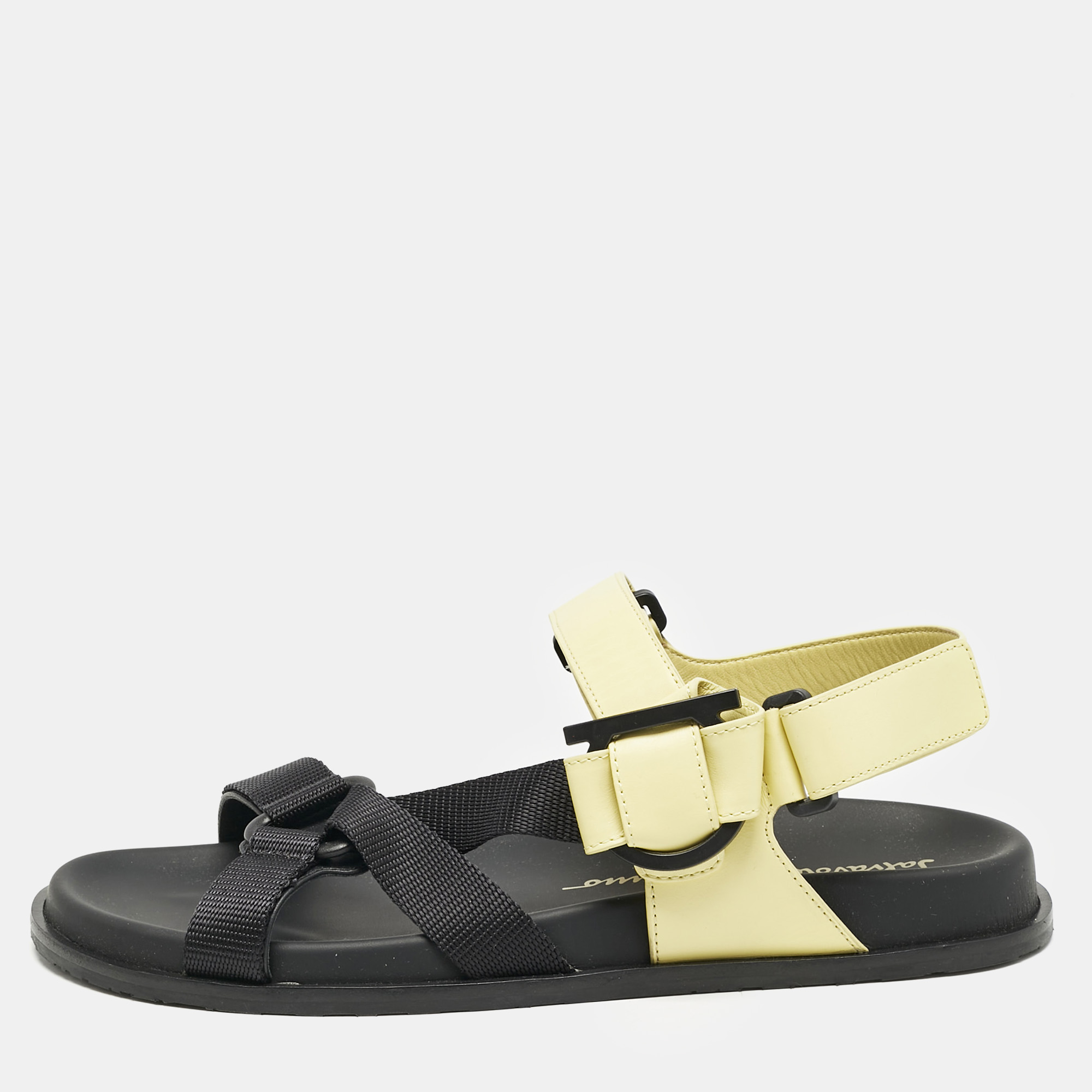 Salvatore Ferragamo Yellow/Black Leather and Canvas Aja Flat Sandals Size 40.5
Salvatore Ferragamo Yellow/Black Leather and Canvas Aja Flat Sandals Size 40.5