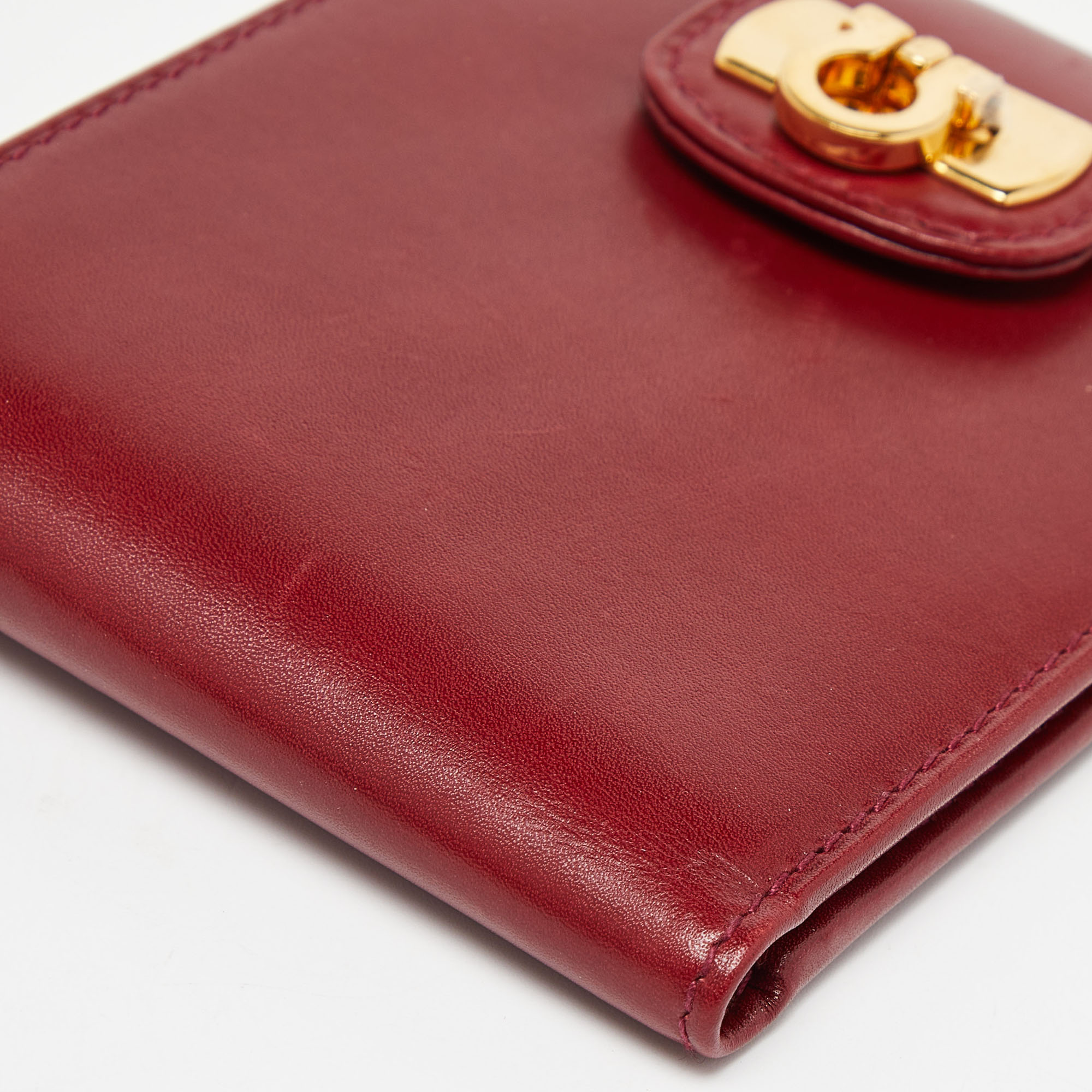 Salvatore Ferragamo Burgundy Leather Gancini Flap Compact Wallet