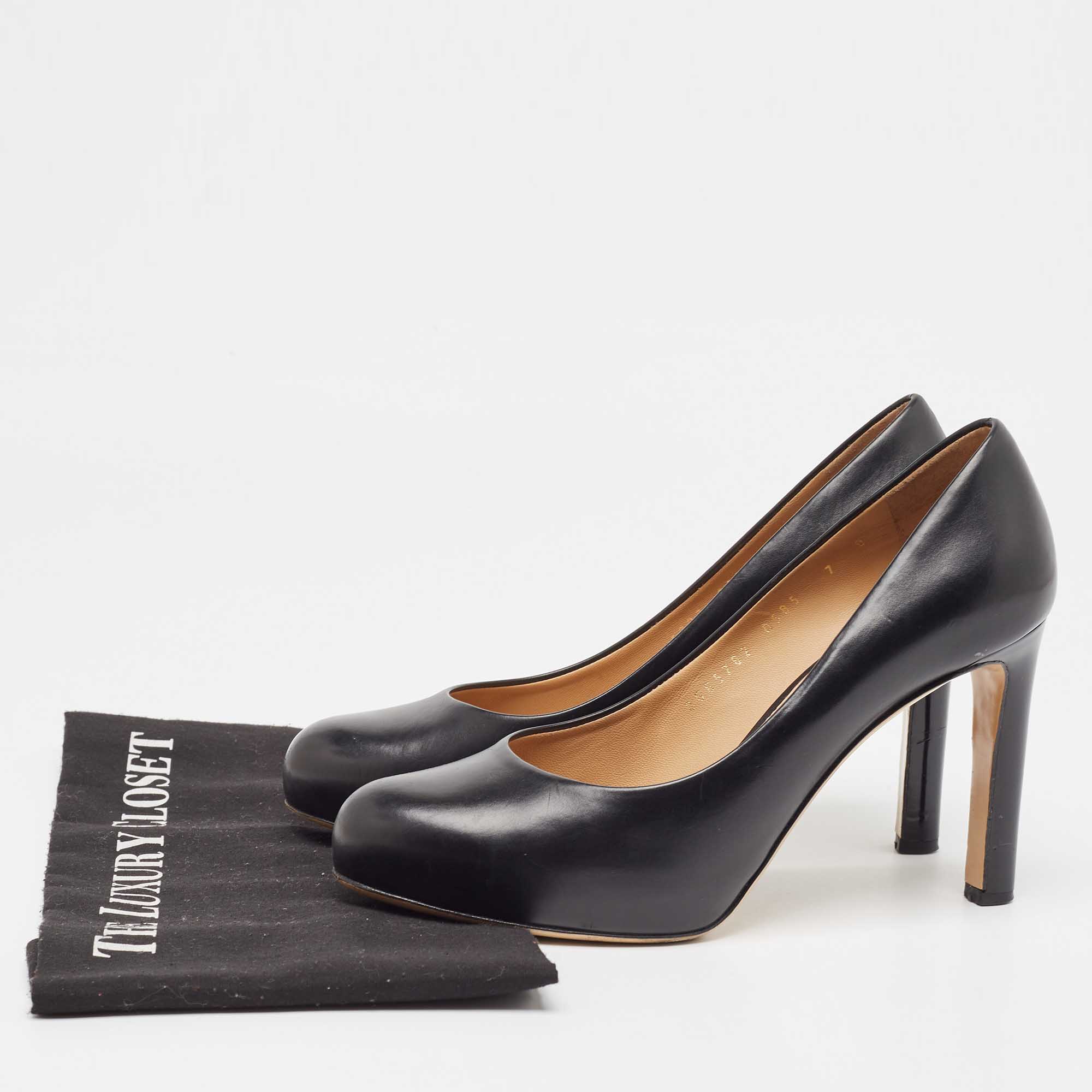 Salvatore Ferragamo Black Leather Round Toe Pumps Size 37.5