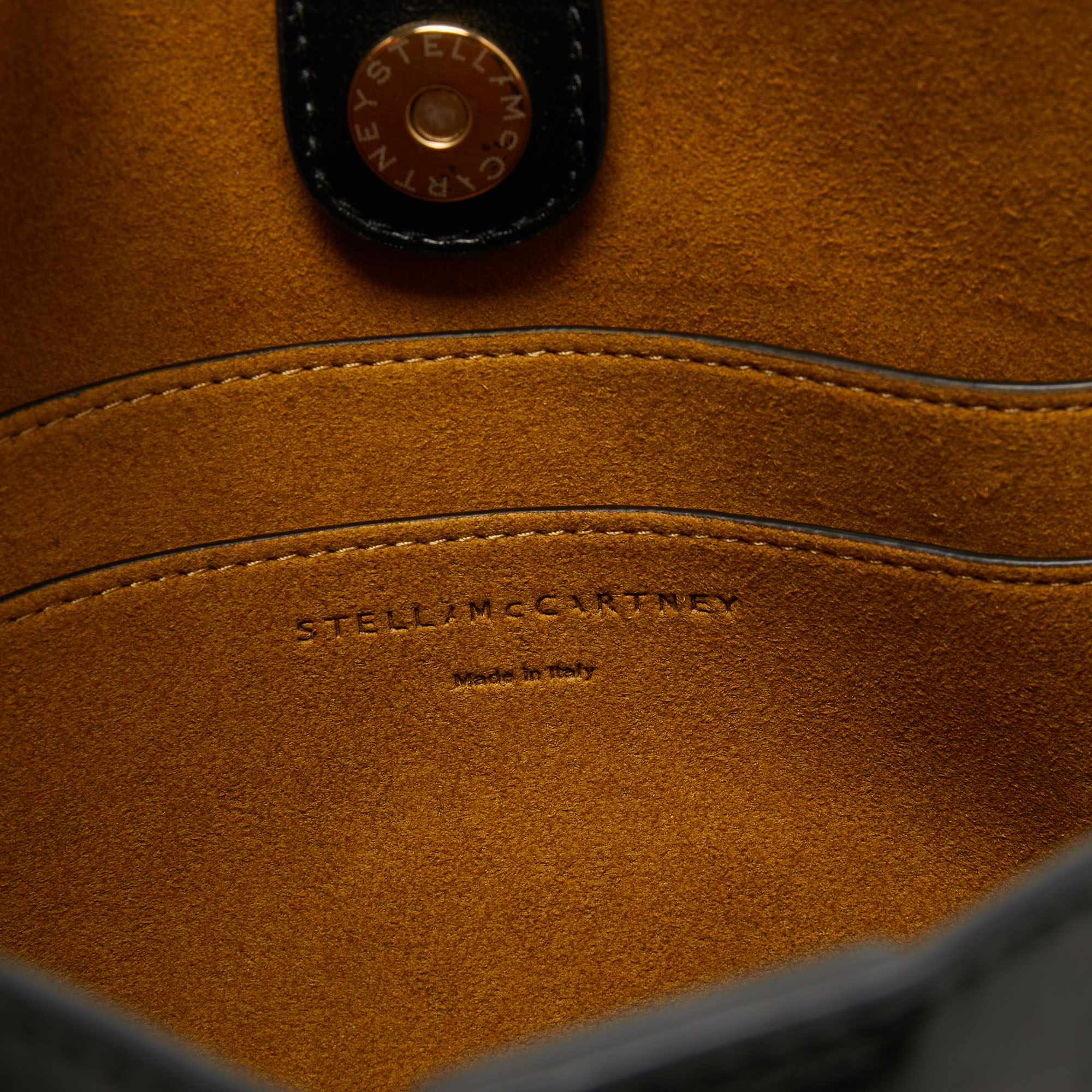 Stella McCartney Black Faux Leather Perforated Logo Shoulder Bag